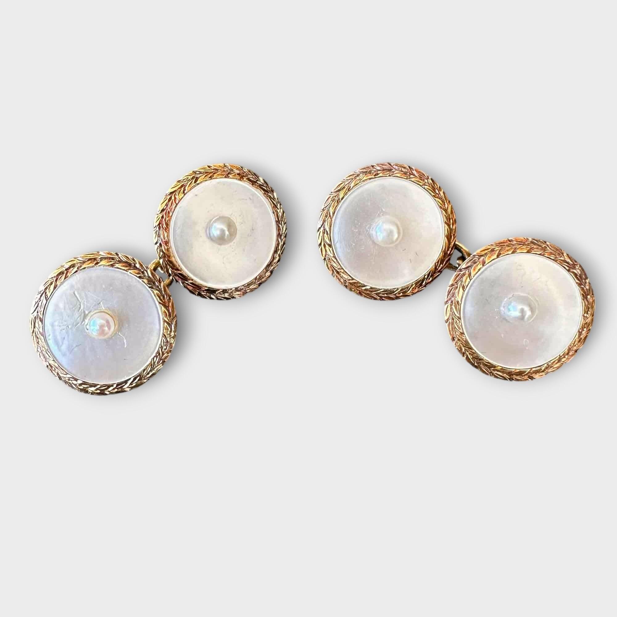 pair of circular mop cufflinks with central pearls and wheat pattern borders