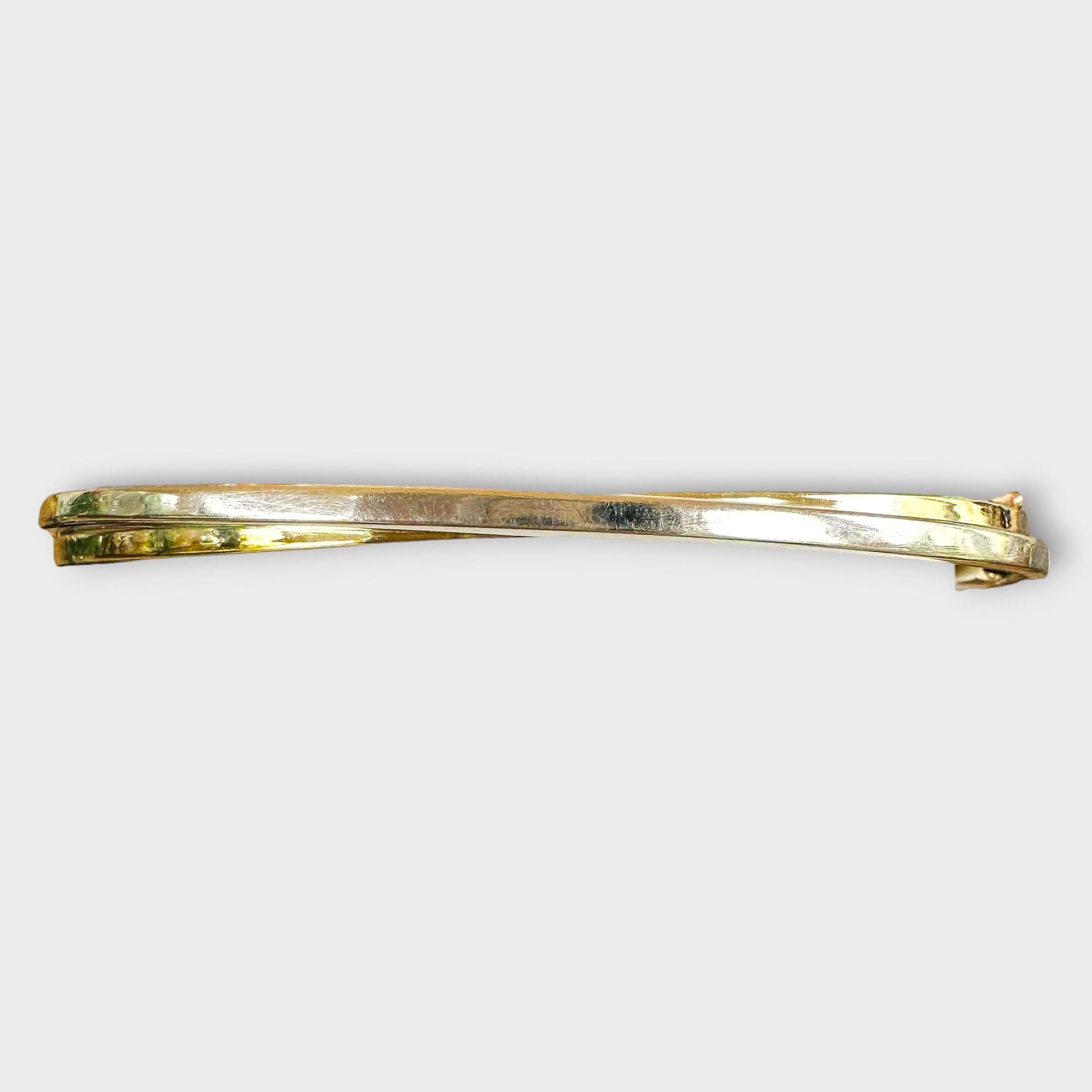 Elegant yellow and white gold bangle, 6.5cm diameter, 4.5mm width, 9-carat gold, perfect for stacking or solo wear.