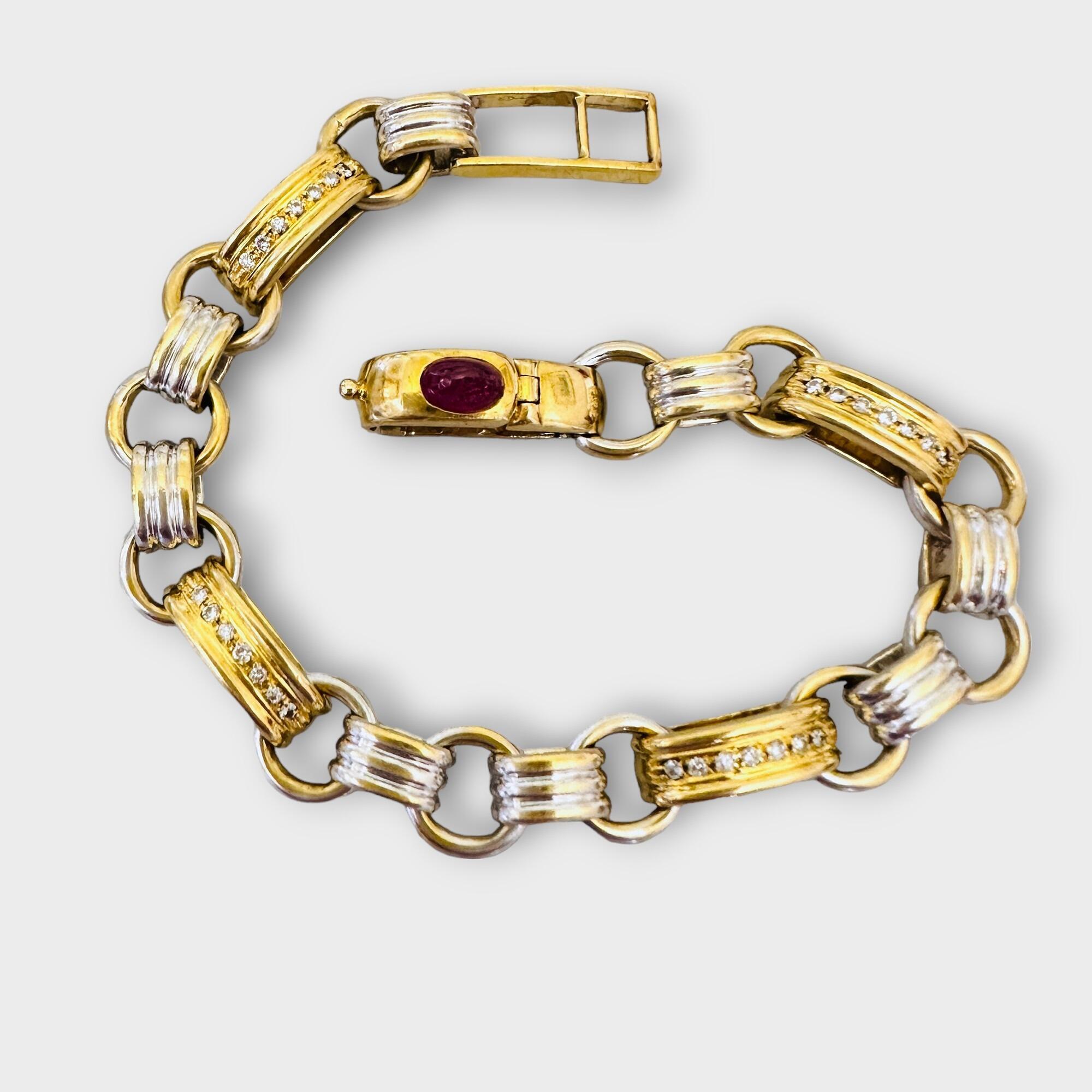 yellow and white gold multi link bracelet with diamonds and a ruby