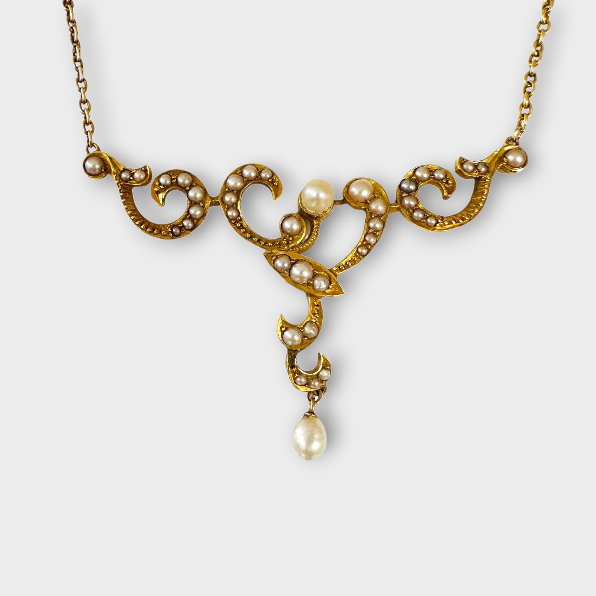 Victorian yellow gold T shaped lavalier pendant with seed pearls