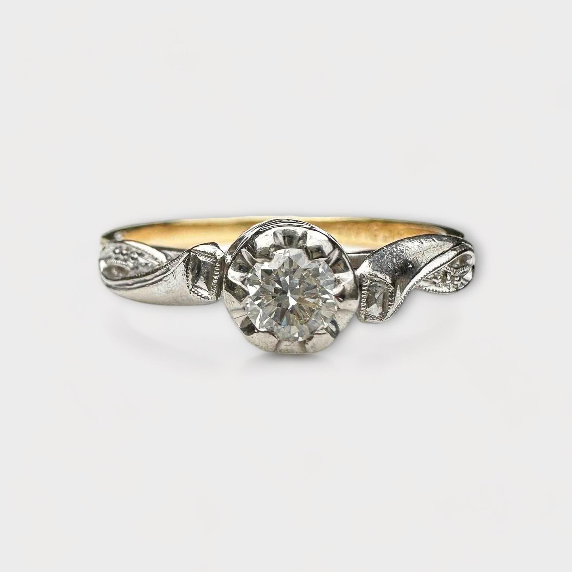 illusion set diamond ring with twist shoulders