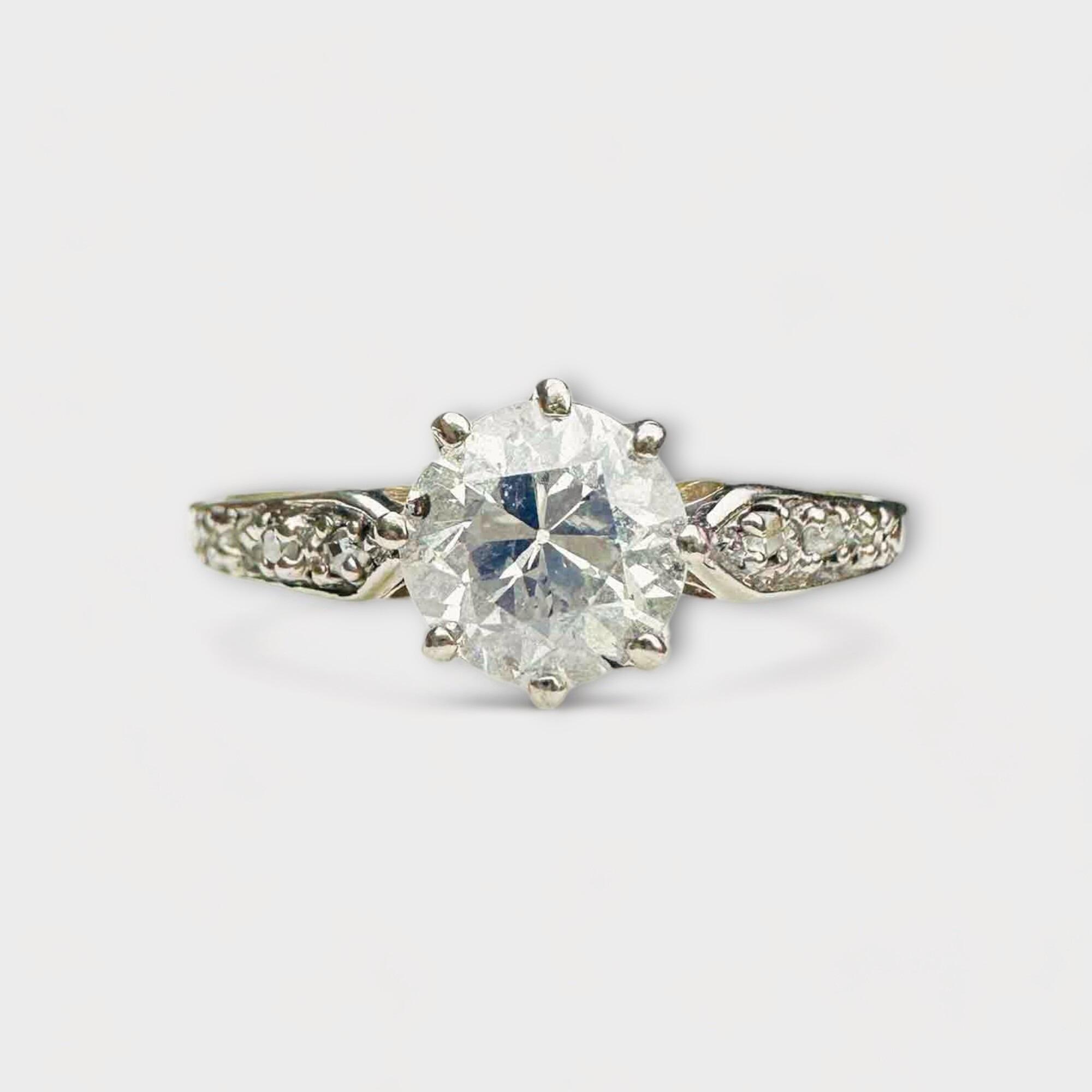 Antique Art Deco engagement ring with 0.74ct old European-cut diamond in platinum claw setting and 18ct yellow gold shank