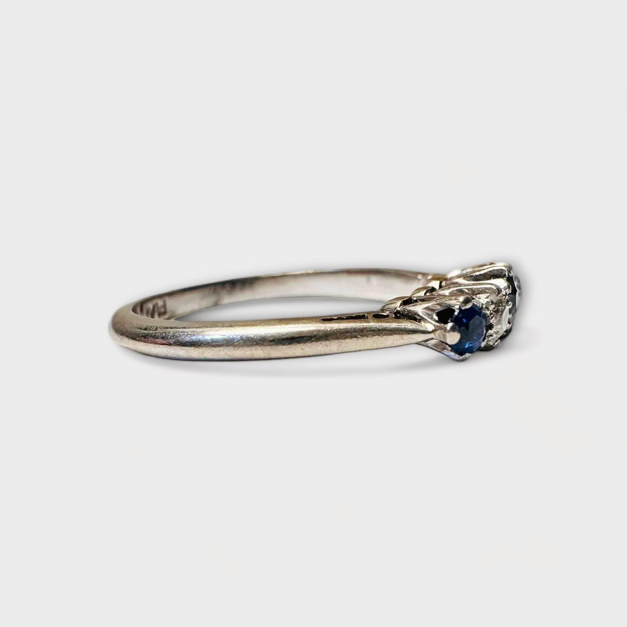 Antique engagement ring with royal blue sapphires and old-cut diamonds in platinum setting, Edwardian era, size UK: J USA: 4.75.