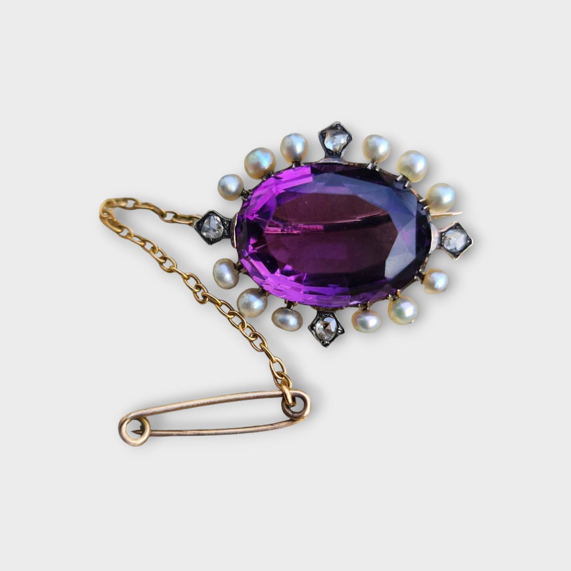 Victorian brooch with 12.5ct violet amethyst, pearls, and rose-cut diamonds in a 15ct gold setting, 27.5x22mm, excellent condition