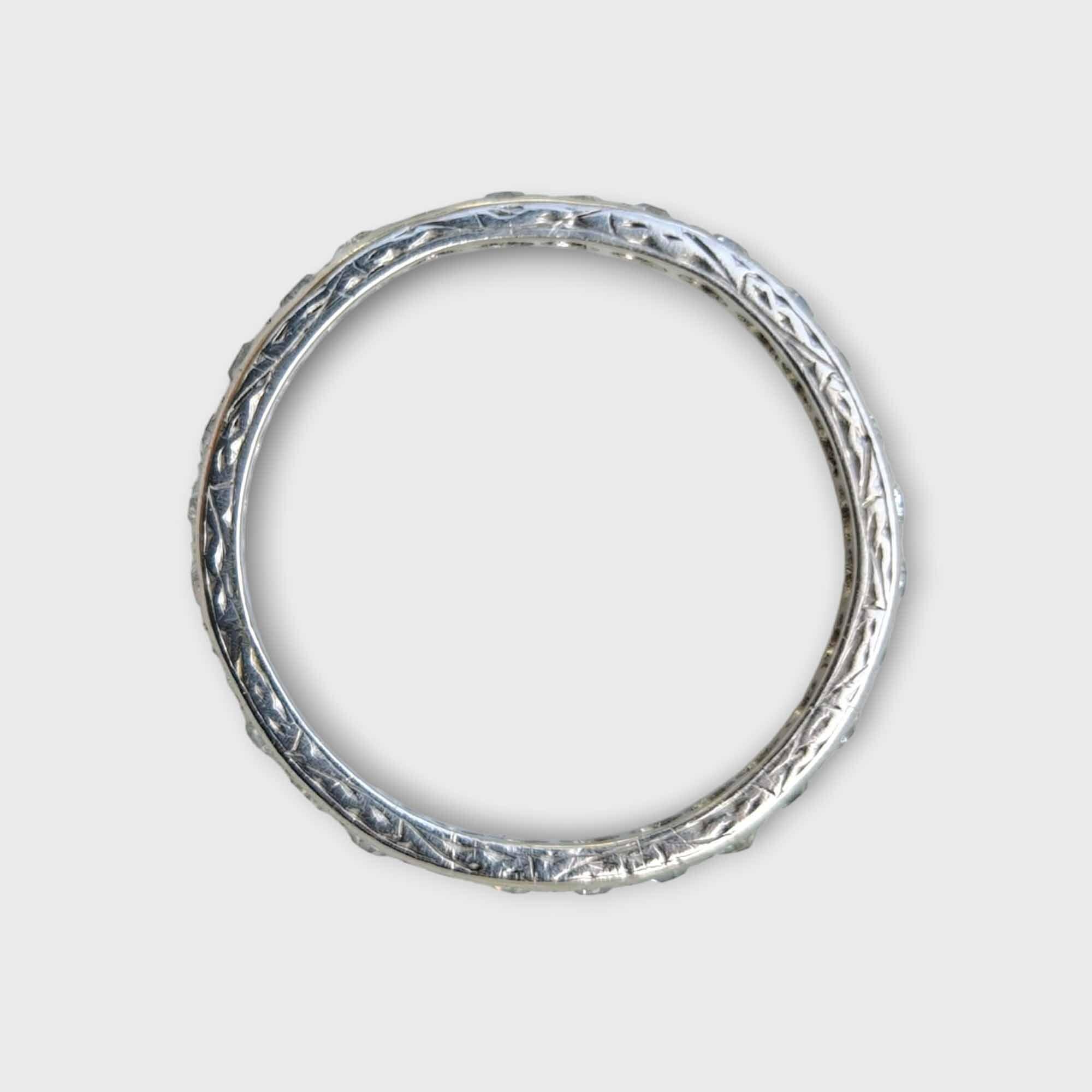 Art Deco diamond eternity ring with 28 diamonds in platinum, engraved detailing, perfect for anniversaries or ring stacks.