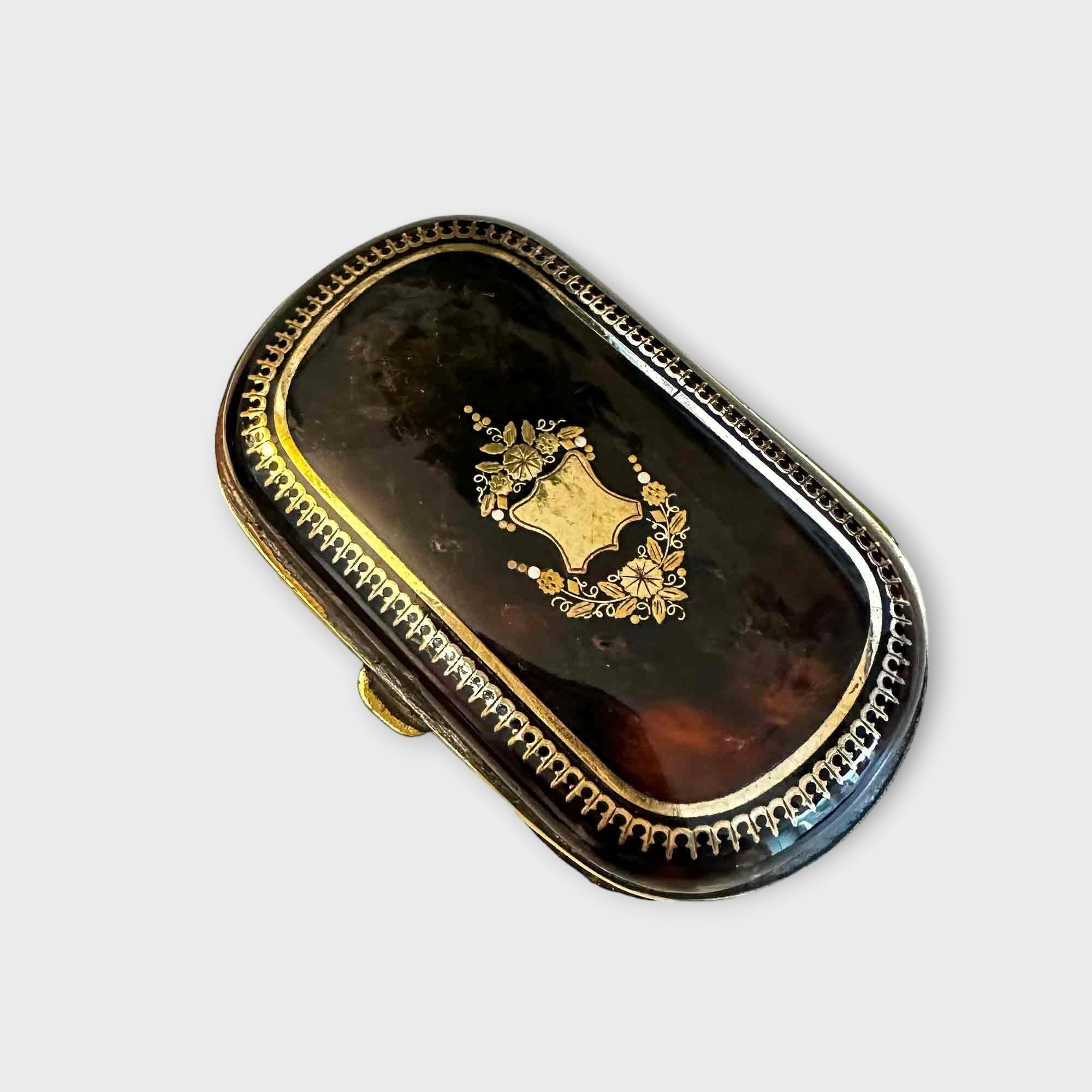French faux tortoiseshell, gold & silver pique purse with intricate foliate design