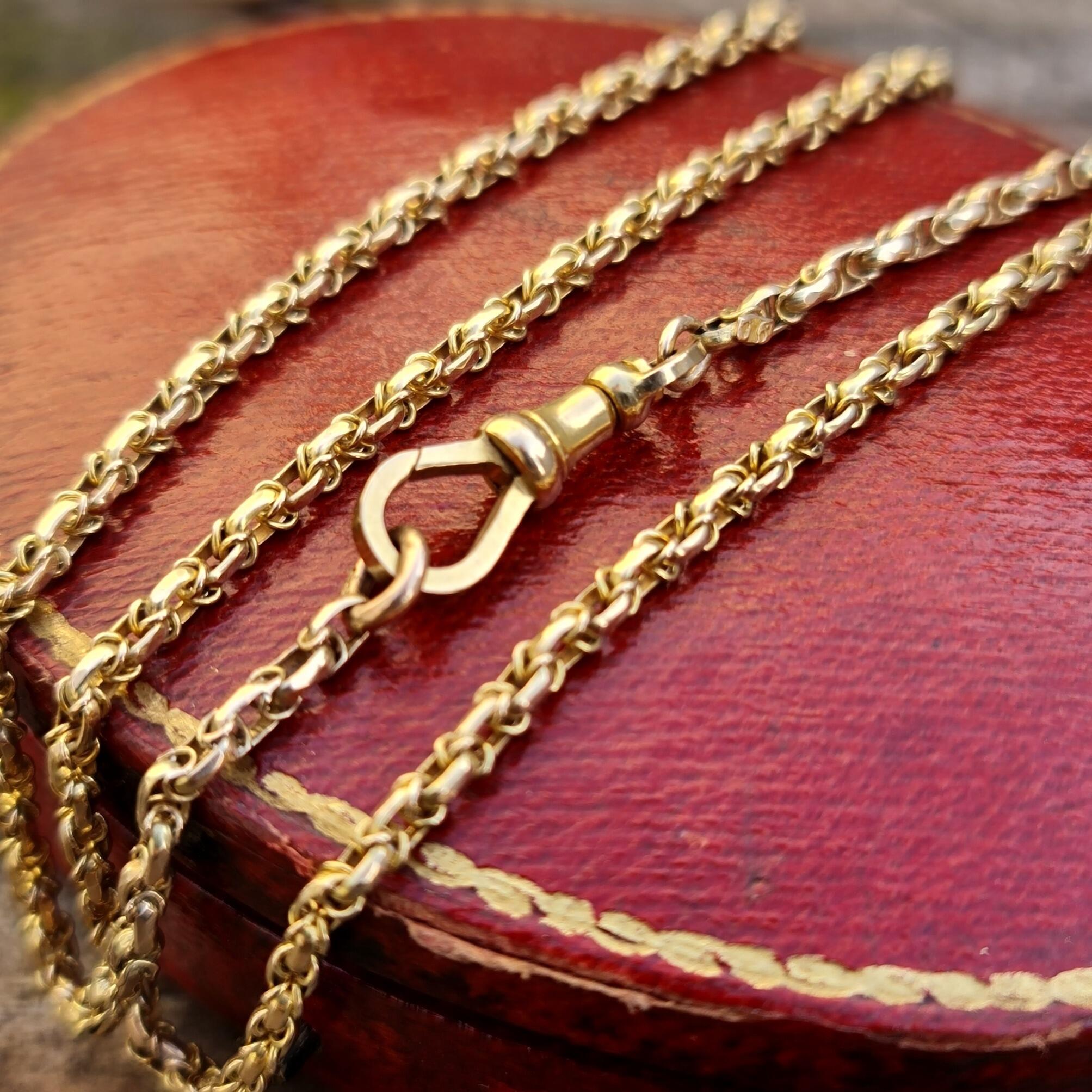 Early 20th century Edwardian 9ct gold fancy link chain with replacement dog clip, intricate gold wirework, 57cm length, 9.4 grams