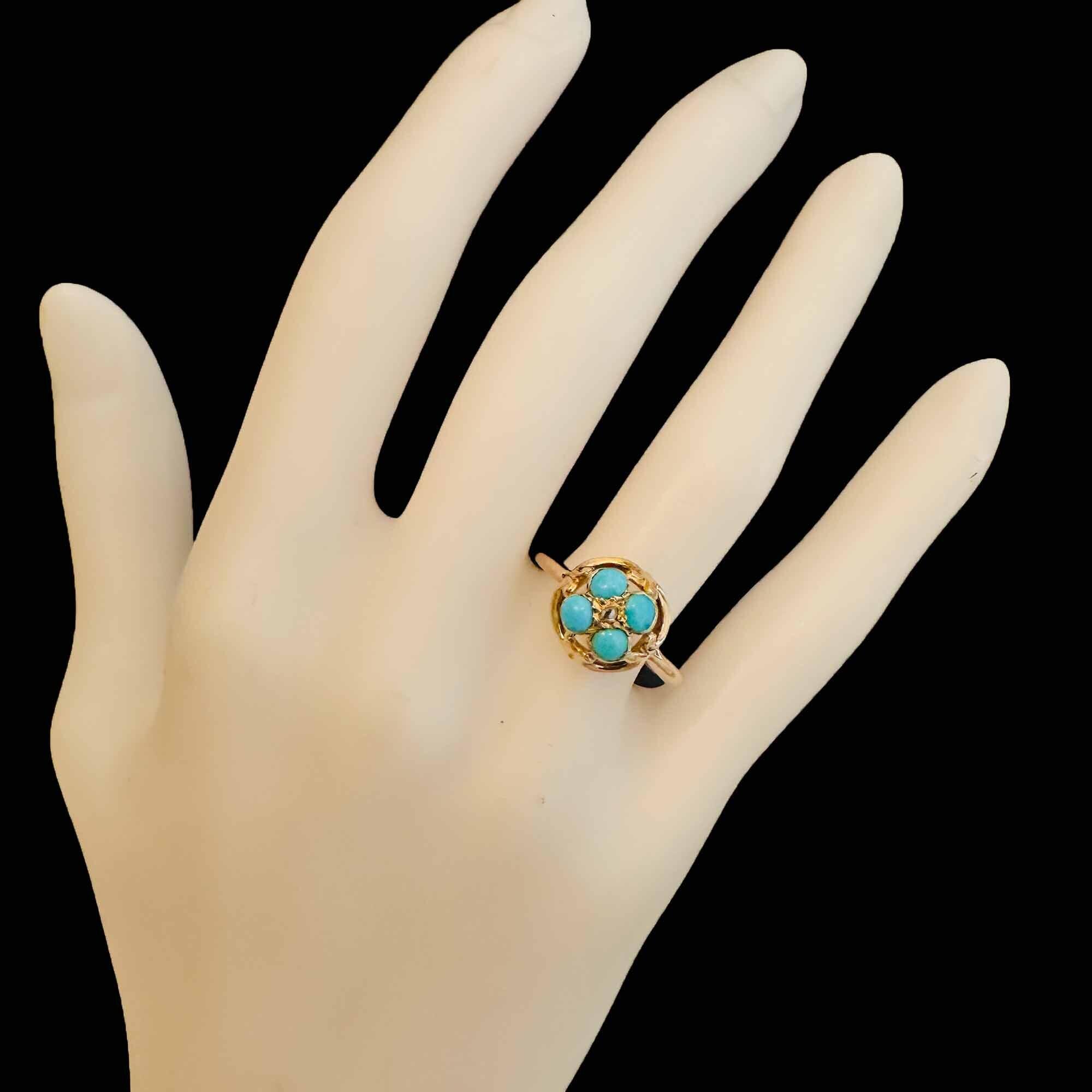 Victorian quatrefoil ring with turquoise gemstones and diamond center