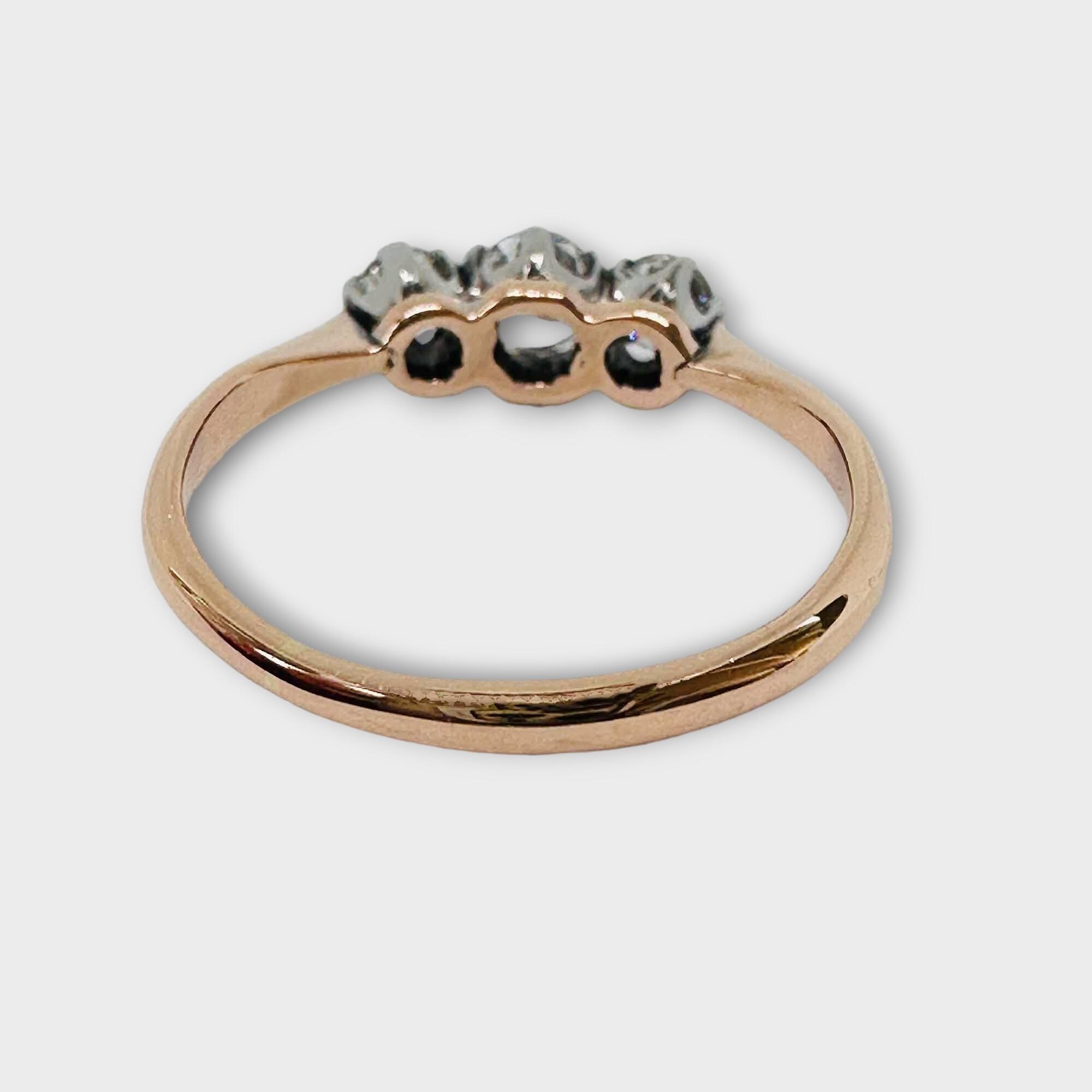 Vintage 1930s engagement ring with 3 old European-cut diamonds set in 18ct rose gold. Diamonds sparkle with character and fire, full of history.