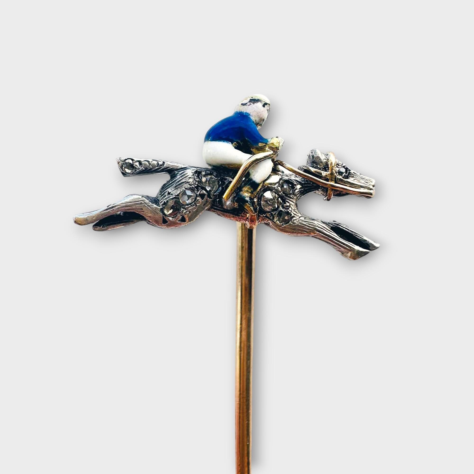 stickpin with enamel jockey on a diamond studded racehorse