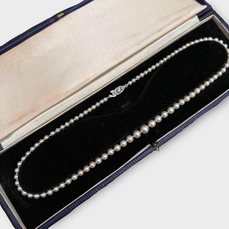 row of cultured saltwater Lotus pearls on white gold diamond clasp