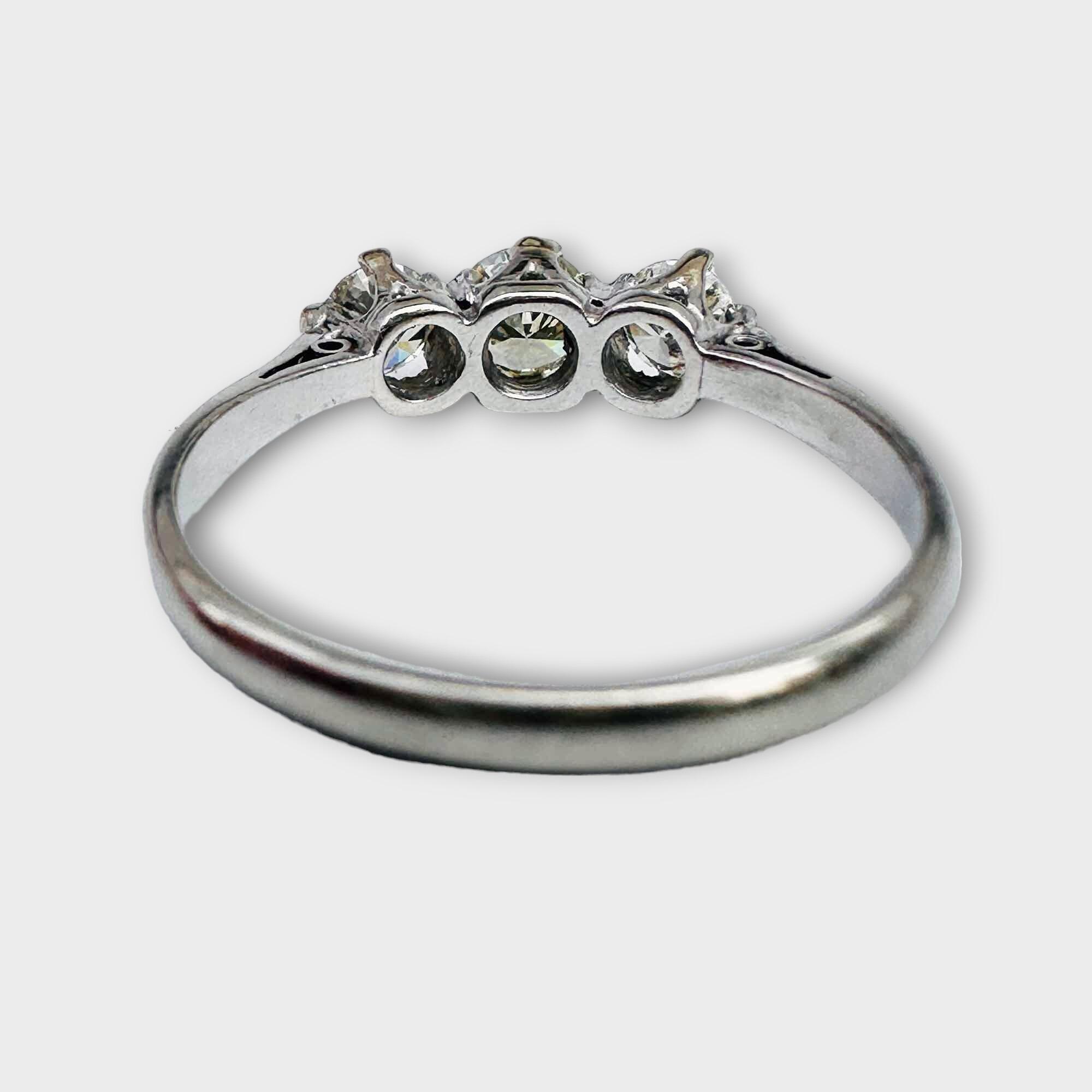 Art Deco three stone diamond trilogy ring in platinum