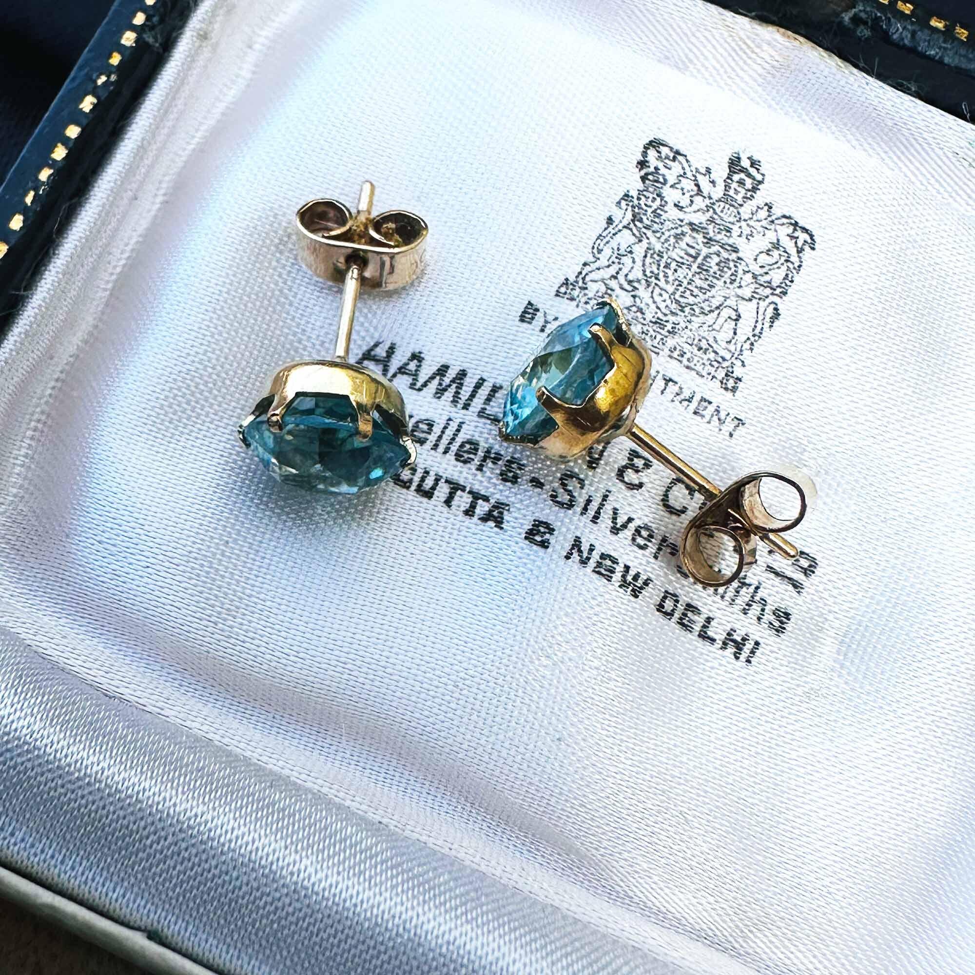 pair of vintage blue zircon stud earrings in 9ct yellow gold