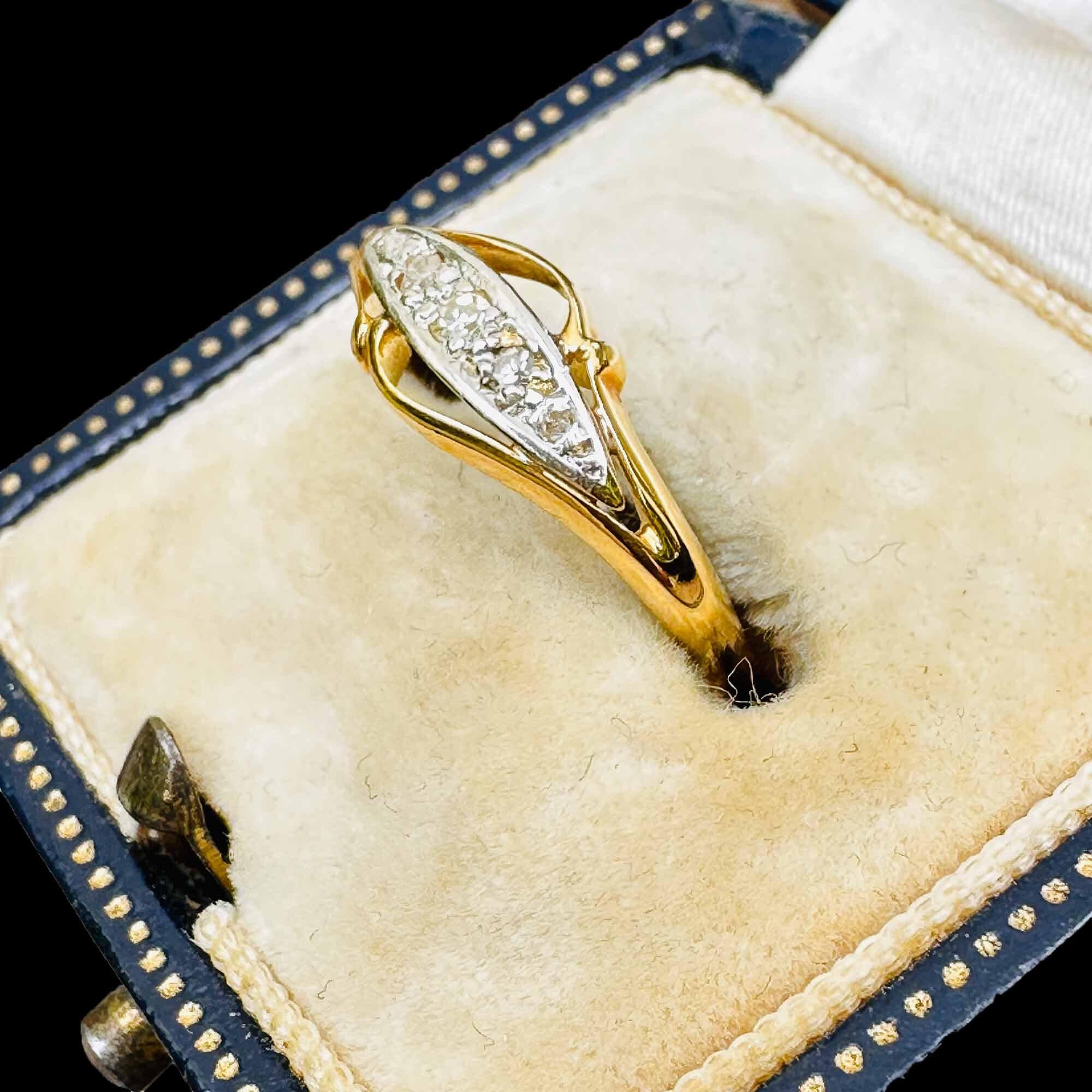 antique Art Deco 18ct yellow gold and platinum five stone diamond boat ring with scroll detail