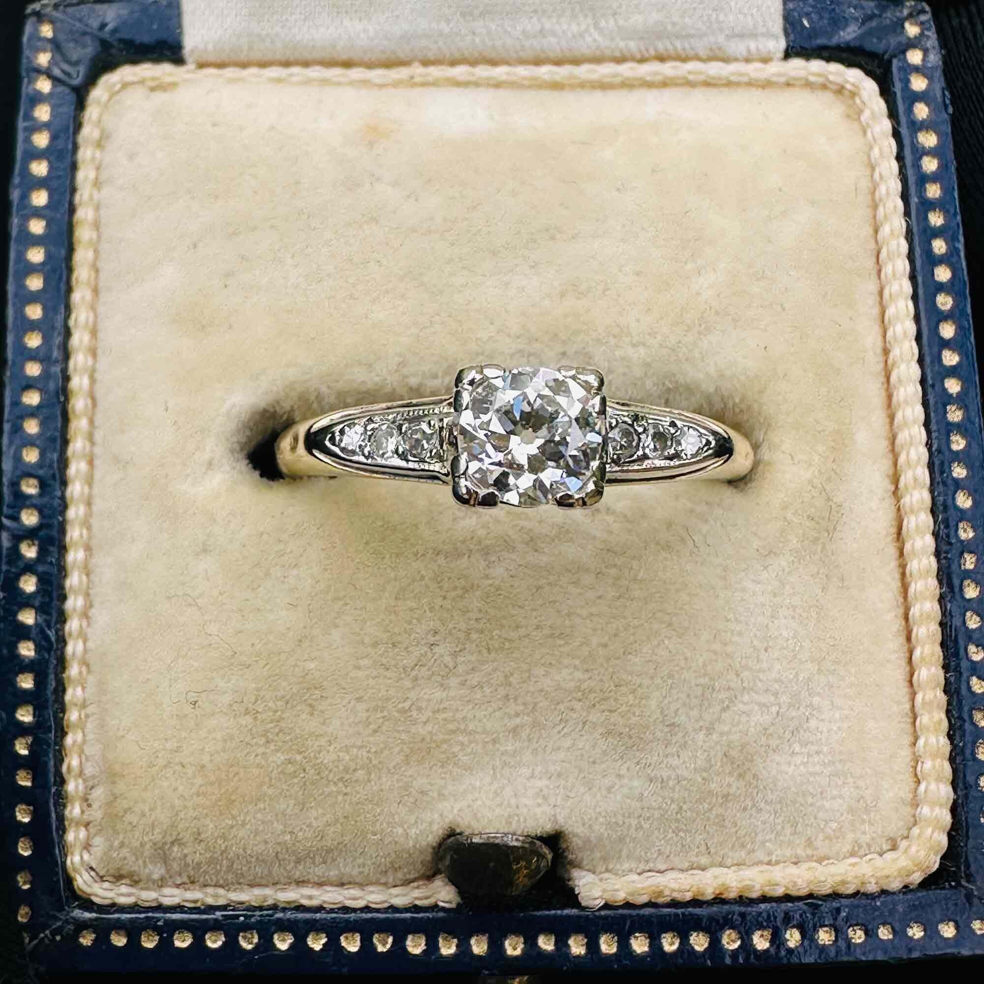 Art Deco European cut diamond ring with diamond shoulders in 18ct yellow gold