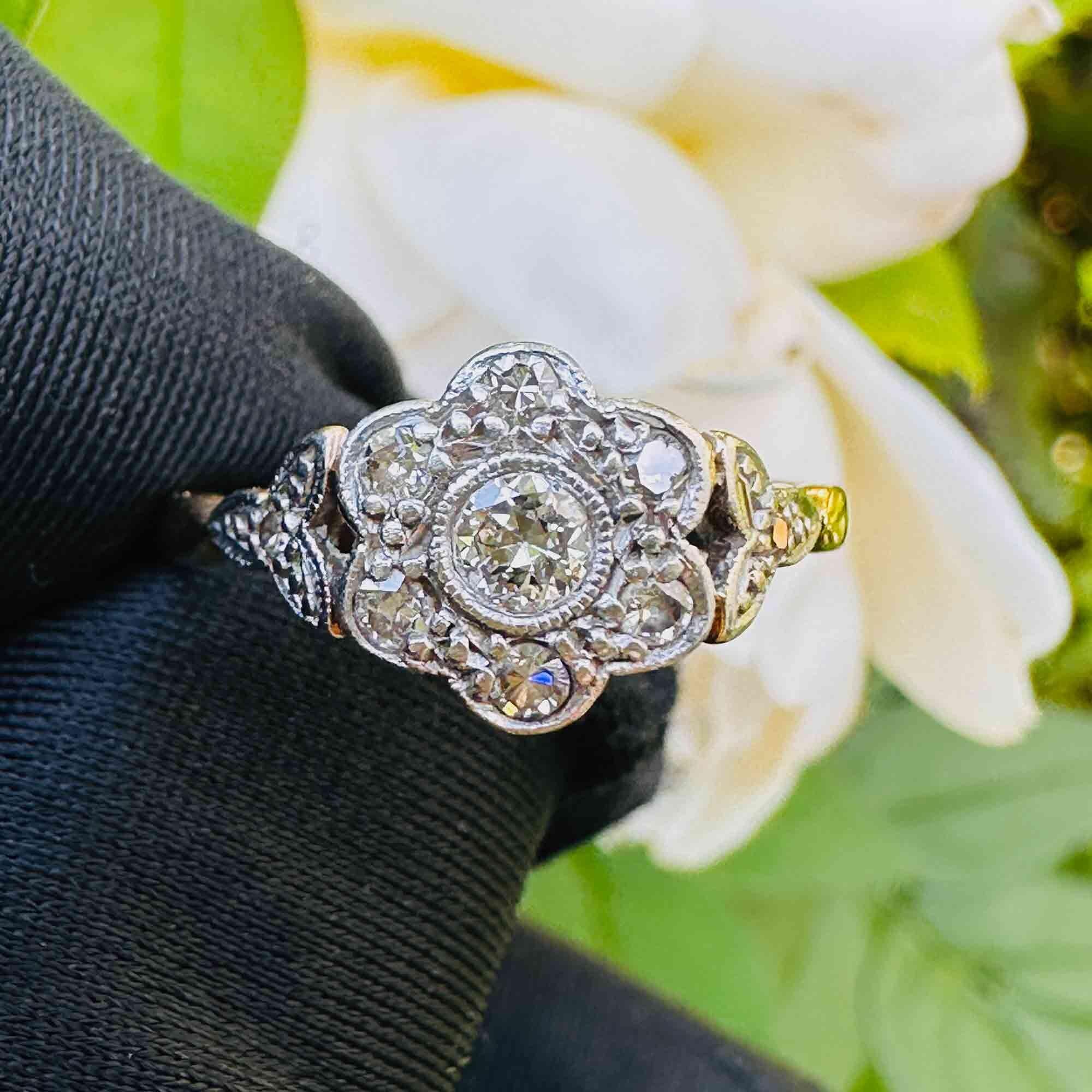 Art Deco 18ct gold diamond daisy cluster ring with shoulder detail