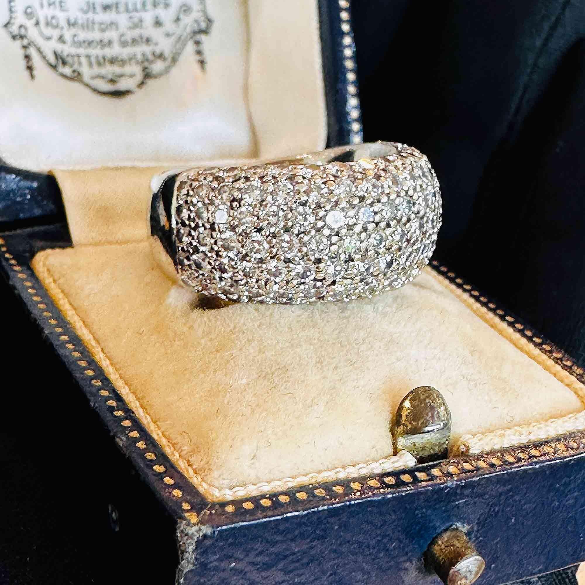 Modern wide pave set diamond half eternity white gold ring