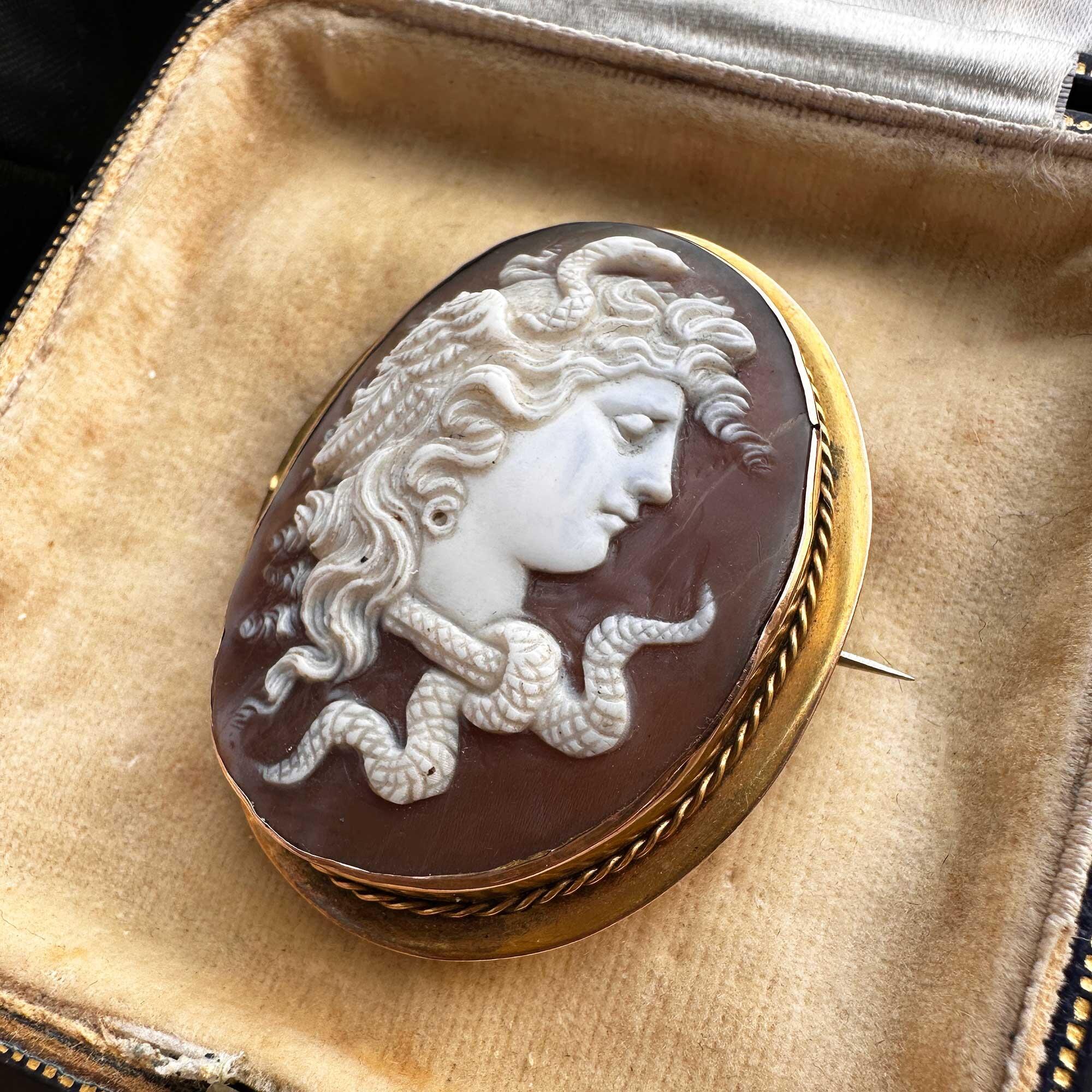 Victorian oval relief sardonyx shell cameo of medusa the gorgon in 18ct yellow gold frame with pin and clasp