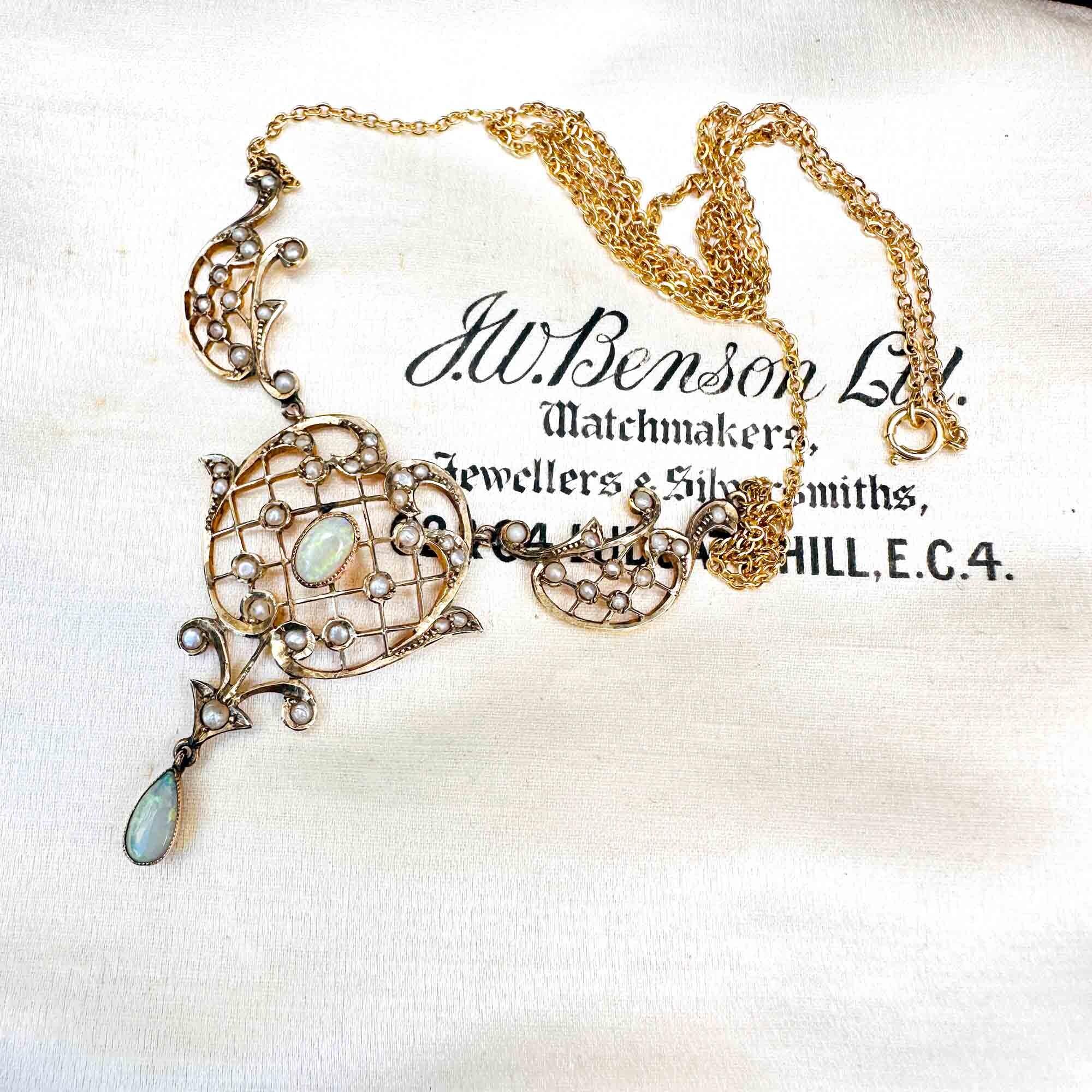 Art Nouveau opal and seed pearl openwork filigree heart necklace with fine chain