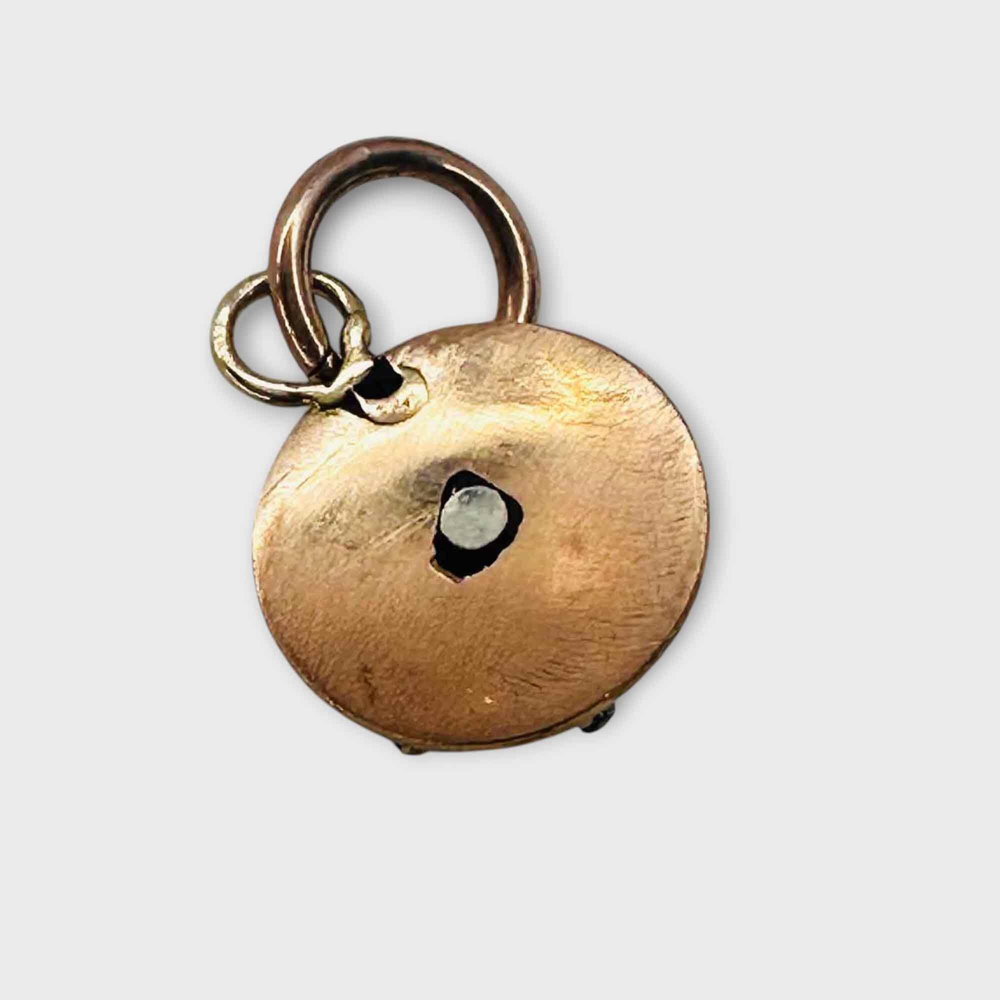 Victorian 15ct rose gold round charm or pendant with black enamel studded with turquoise and diamond gemstones