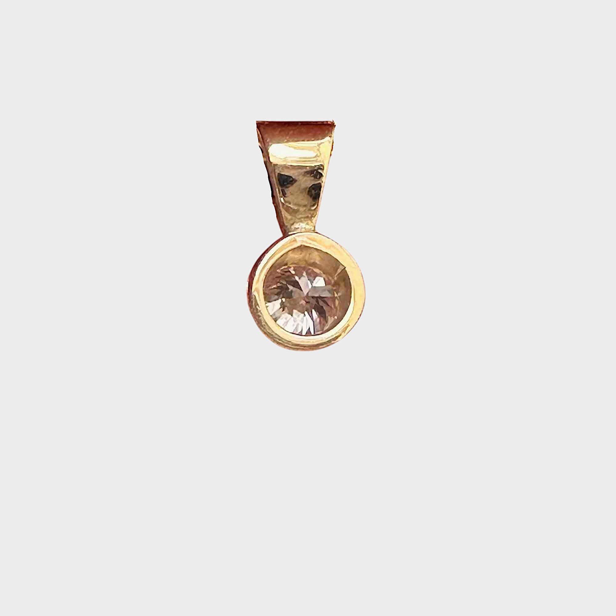 modern 18ct gold bezel set solitaire diamond pendant or charm