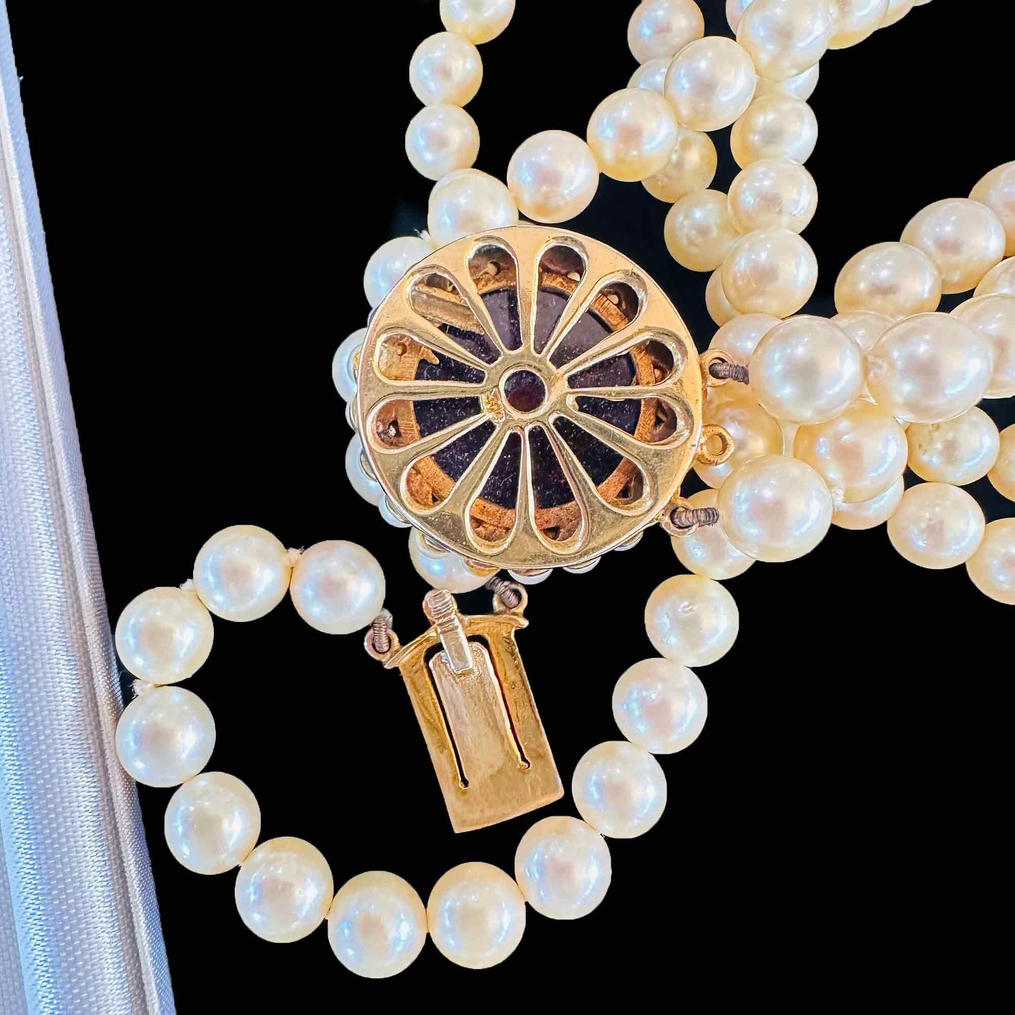 Mid-century cultured pearl necklace on 9ct gold clasp with cabochon amethyst and seed pearl star design
