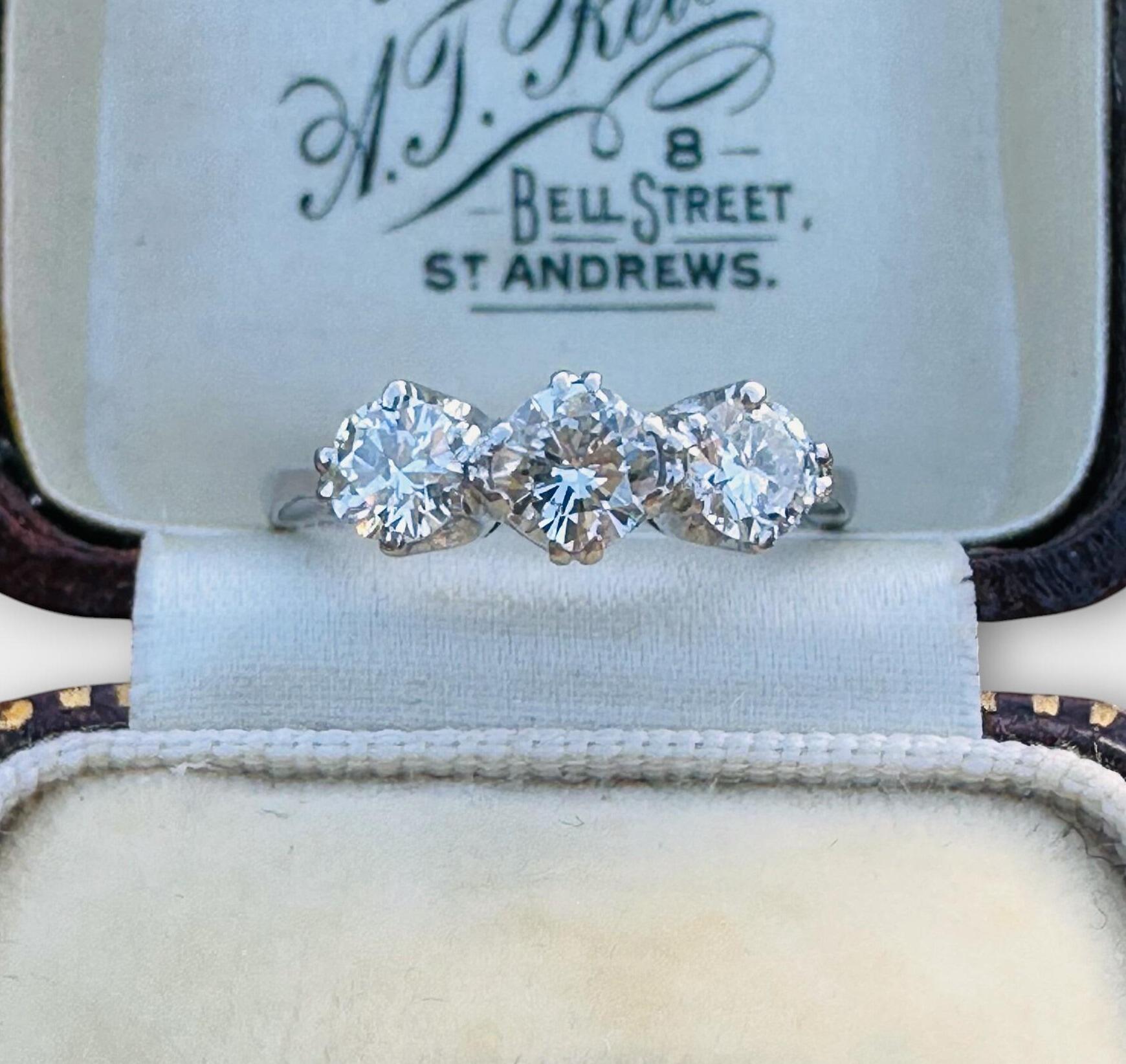 Mid-century platinum and brilliant cut diamond trilogy/three stone engagement ring