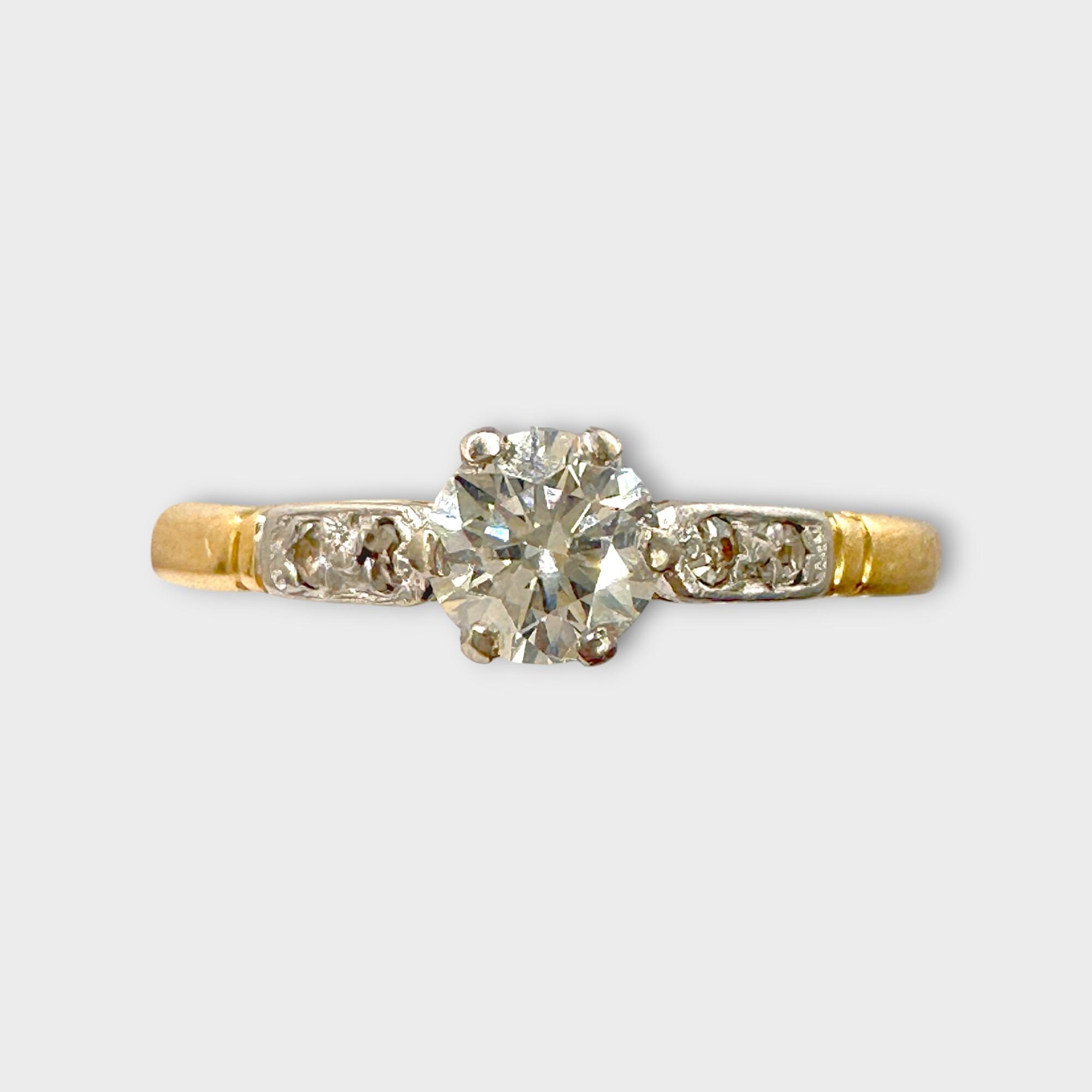 Art Deco 0.45ct Diamond Solitaire Engagement Ring, with diamond shoulders on grey background, facing forwards
