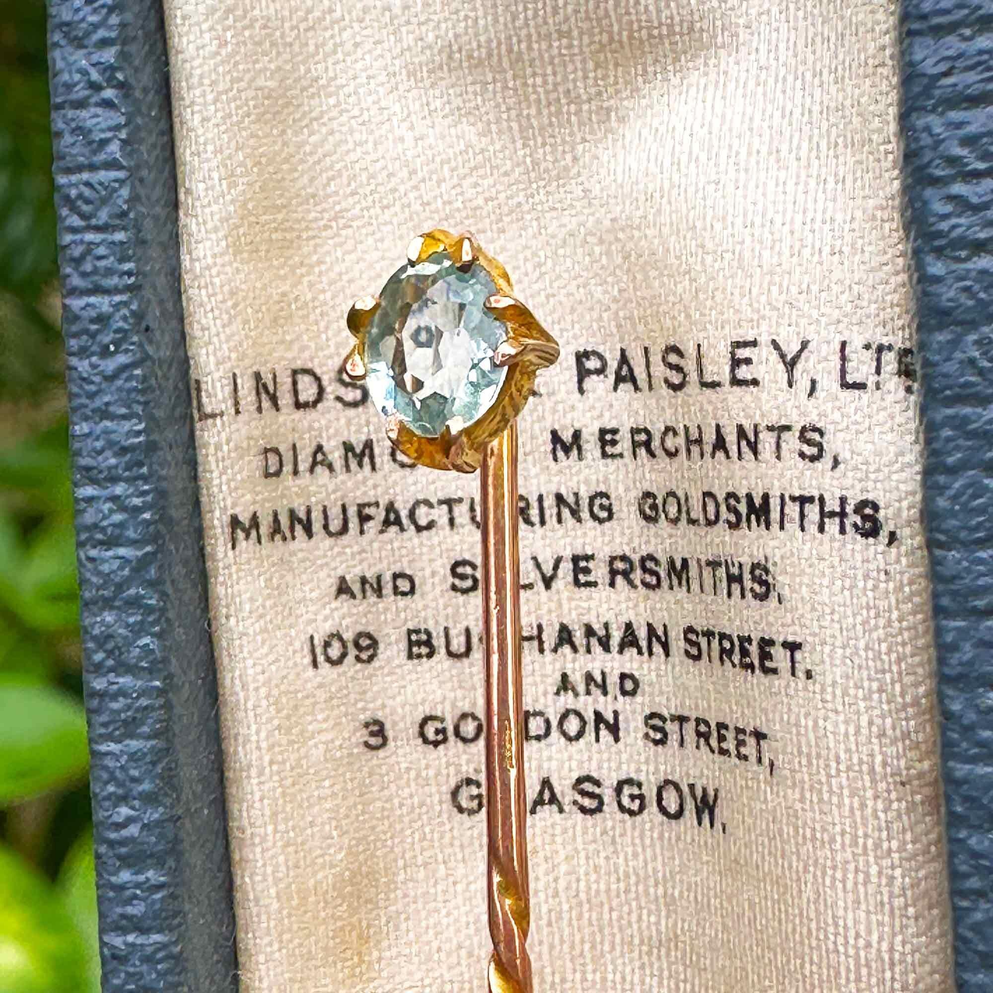 Antique 15ct gold Aquamarine solitaire stick pin in antique box, side view.