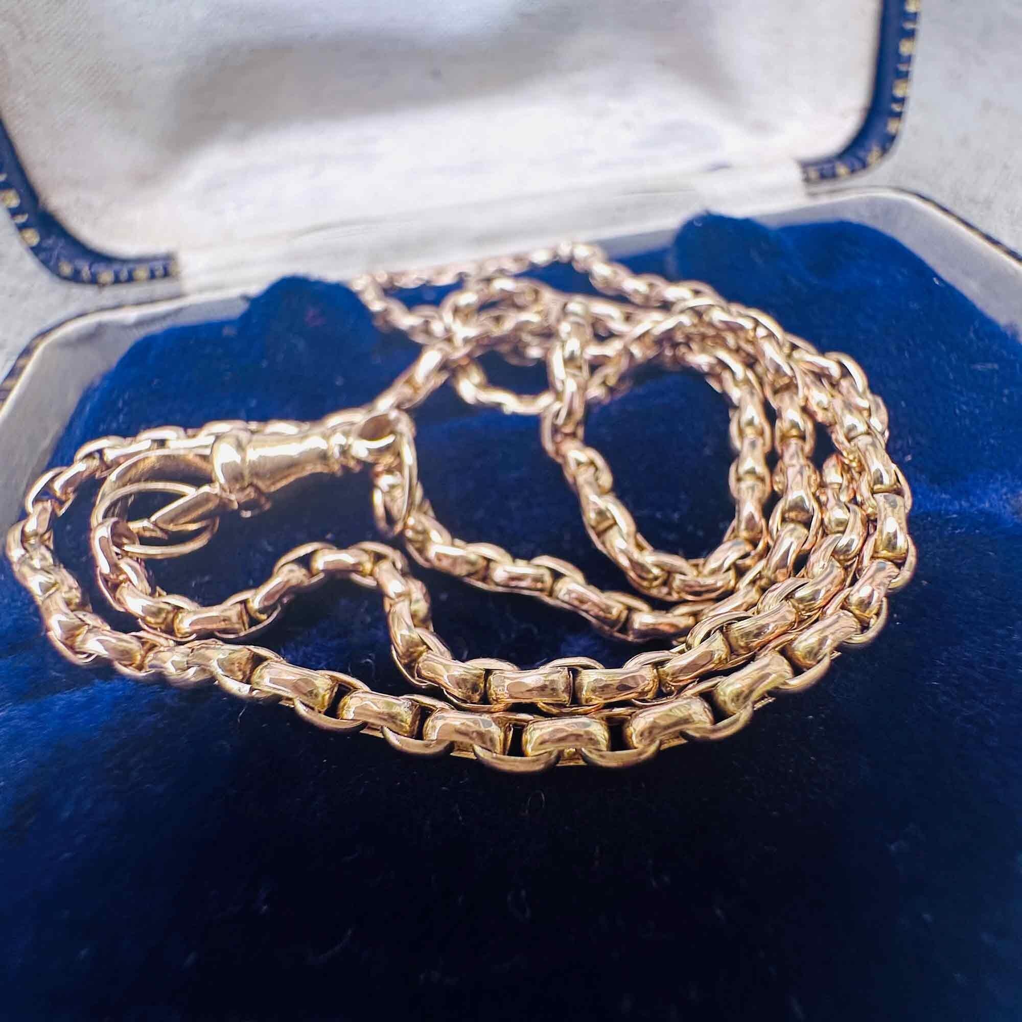 Victorian 9ct rose gold faceted belcher link chain with dog clip clasp in blue velvet antique box.