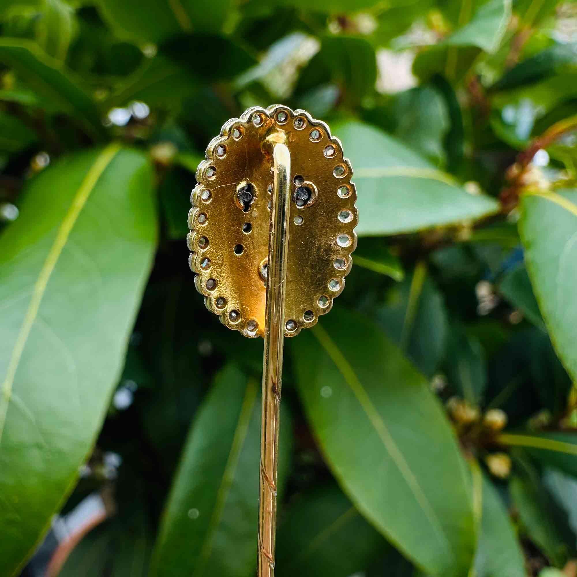 Bespoke 14k gold and diamond monogram LV stick pin with garden background, reversed view