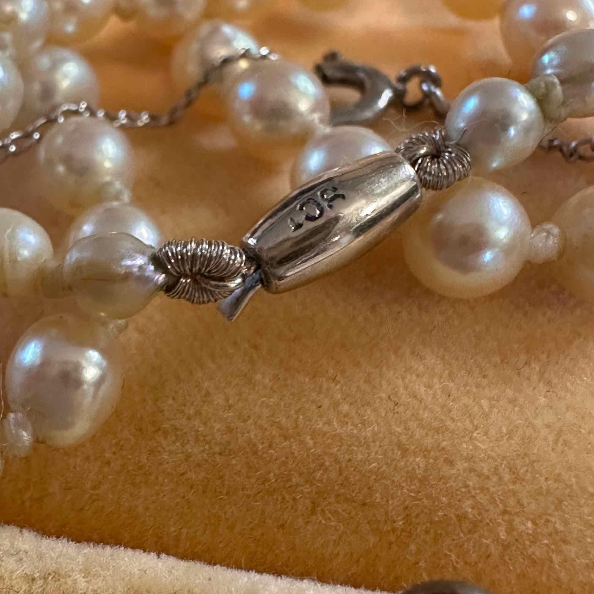 Vintage Saltwater cultured graduated Pearl necklace on 9ct white gold barrel clasp in original Ciro box.