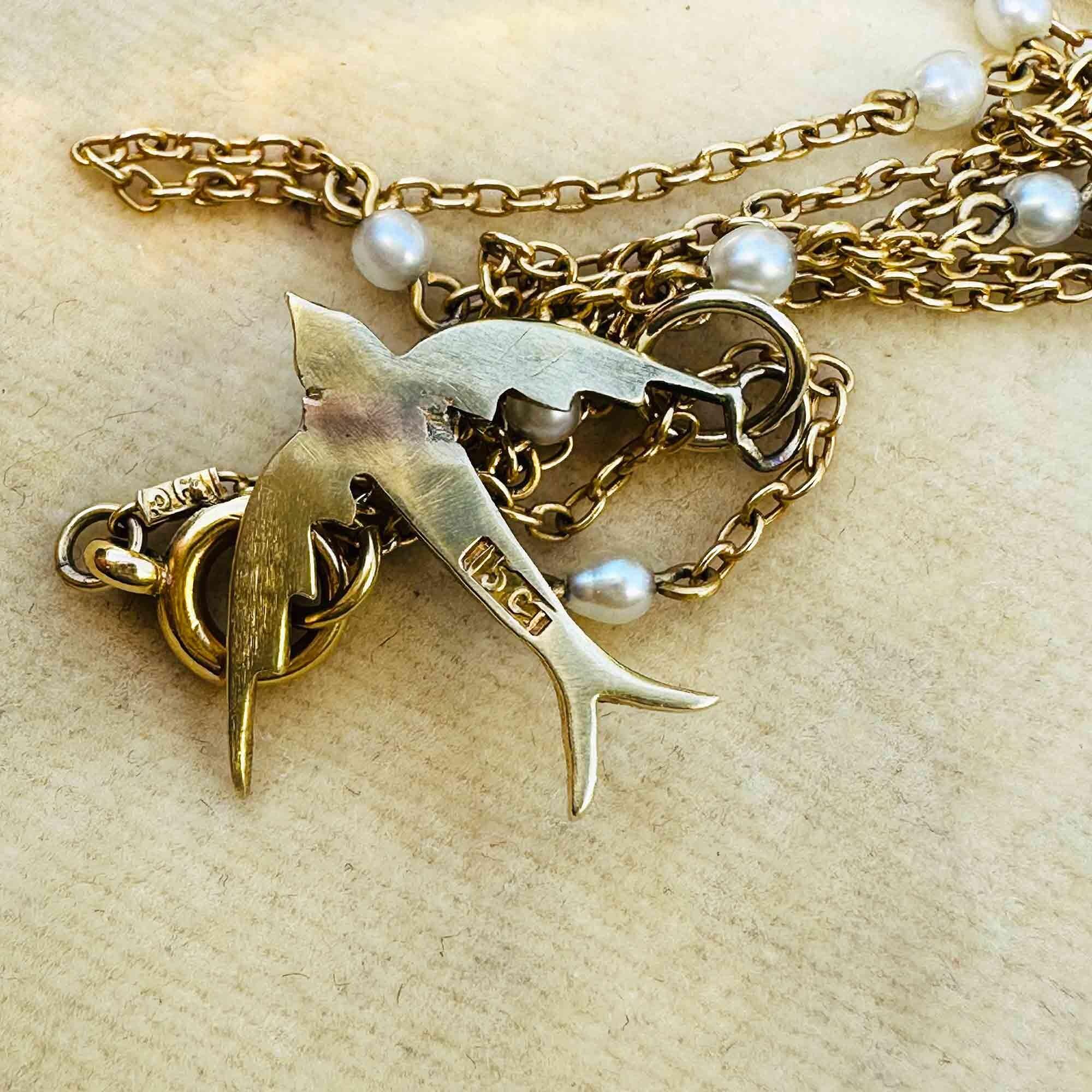 Edwardian 15k gold seed pearl swallow pendant / charm, reverse displayed with antique pearl chain on antique box