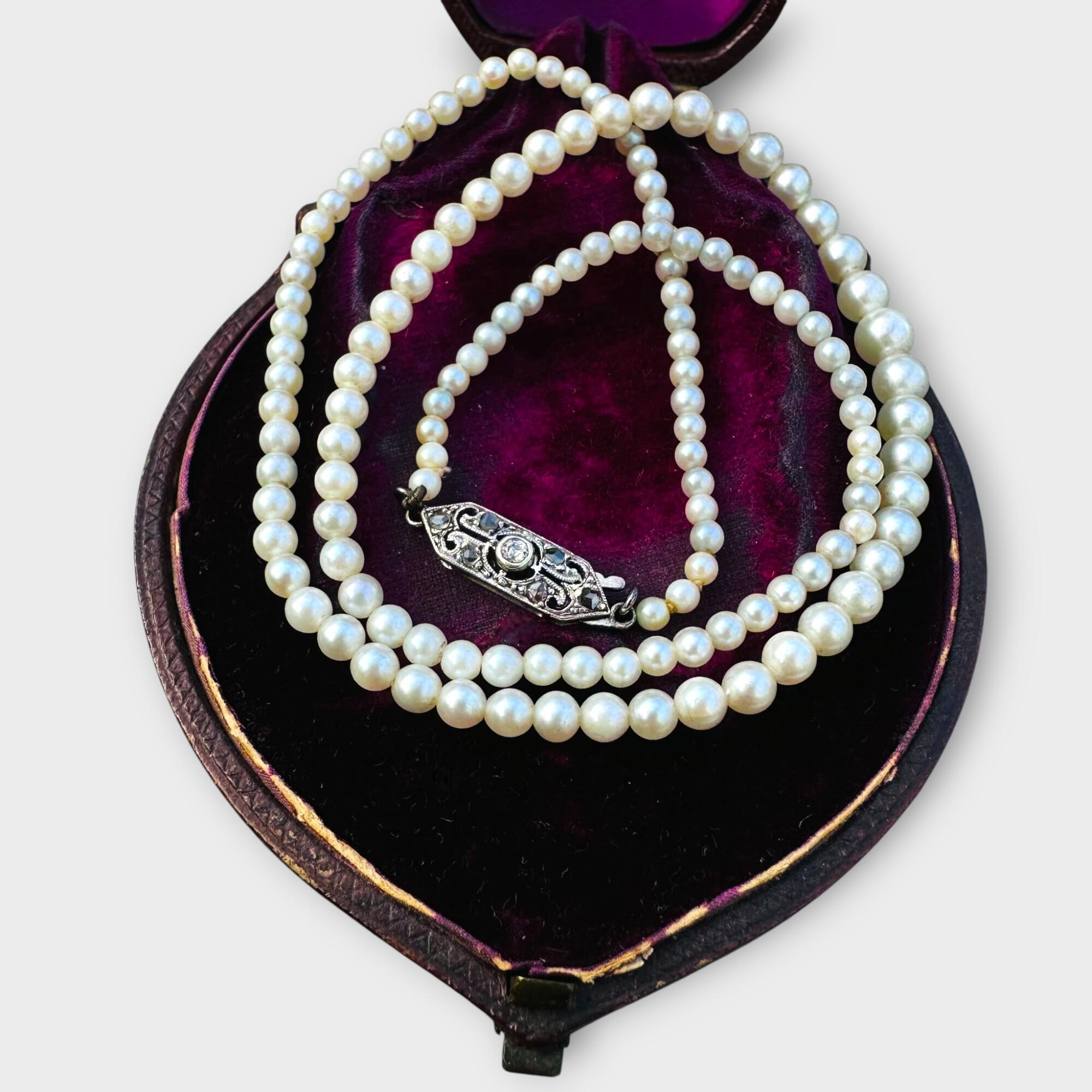 Art Deco graduated cultured pearl necklace with diamond clasp on velvet  antique box