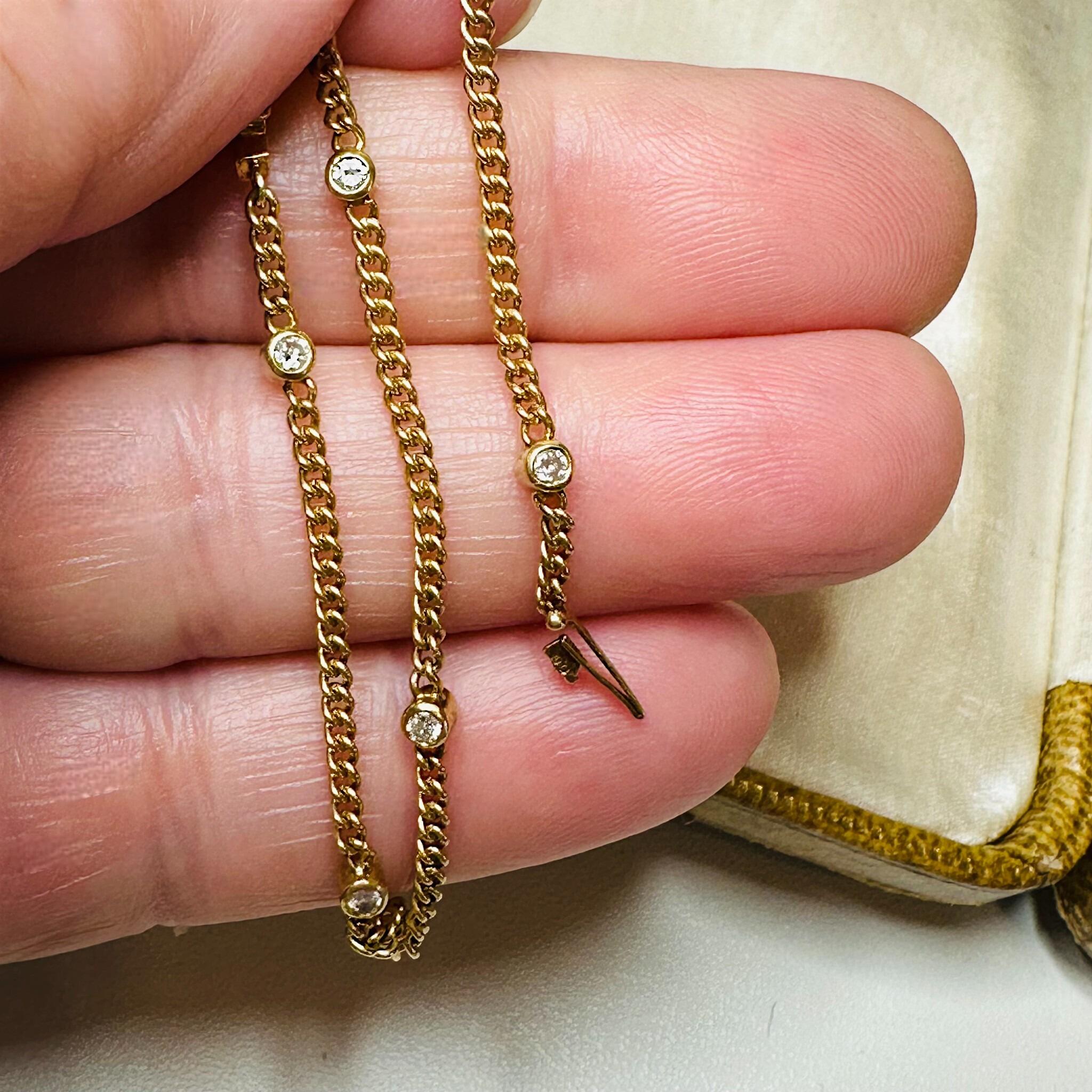 18ct Gold & Diamond Station Curb Link Bracelet – 7.5″ / 19cm, London 1978, held in models hand.