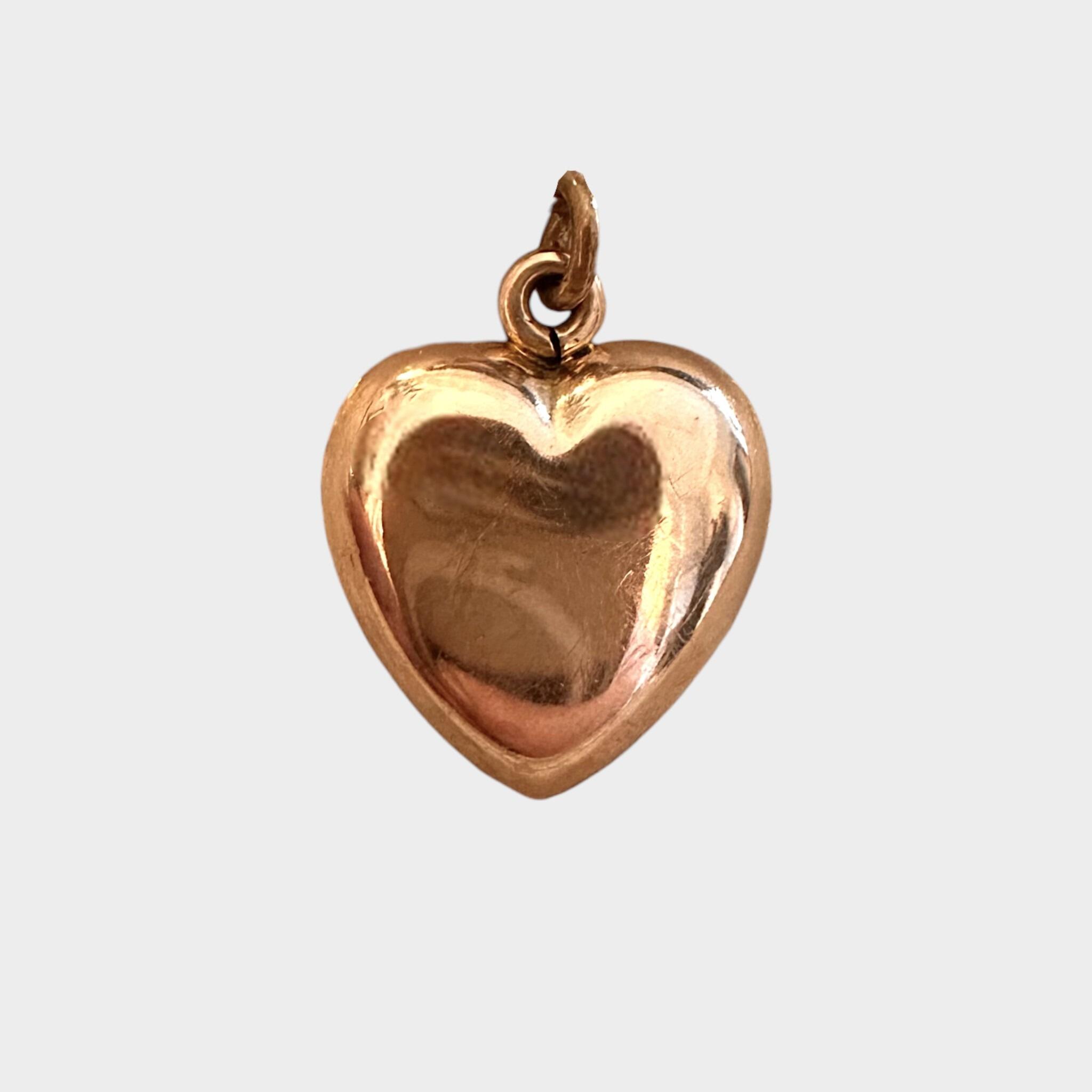 15ct Rose Gold Puffy Heart Pendant, grey background.