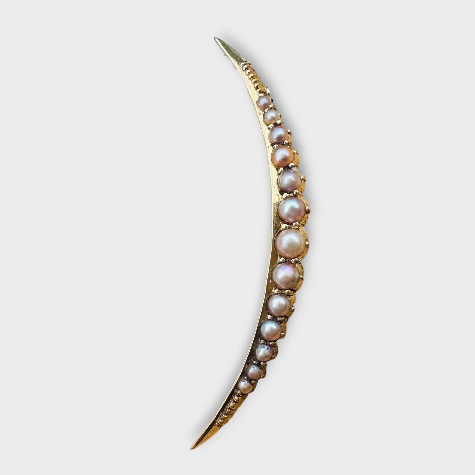 Antique 15ct gold crescent moon pendant set with seed pearls, Victorian era.
