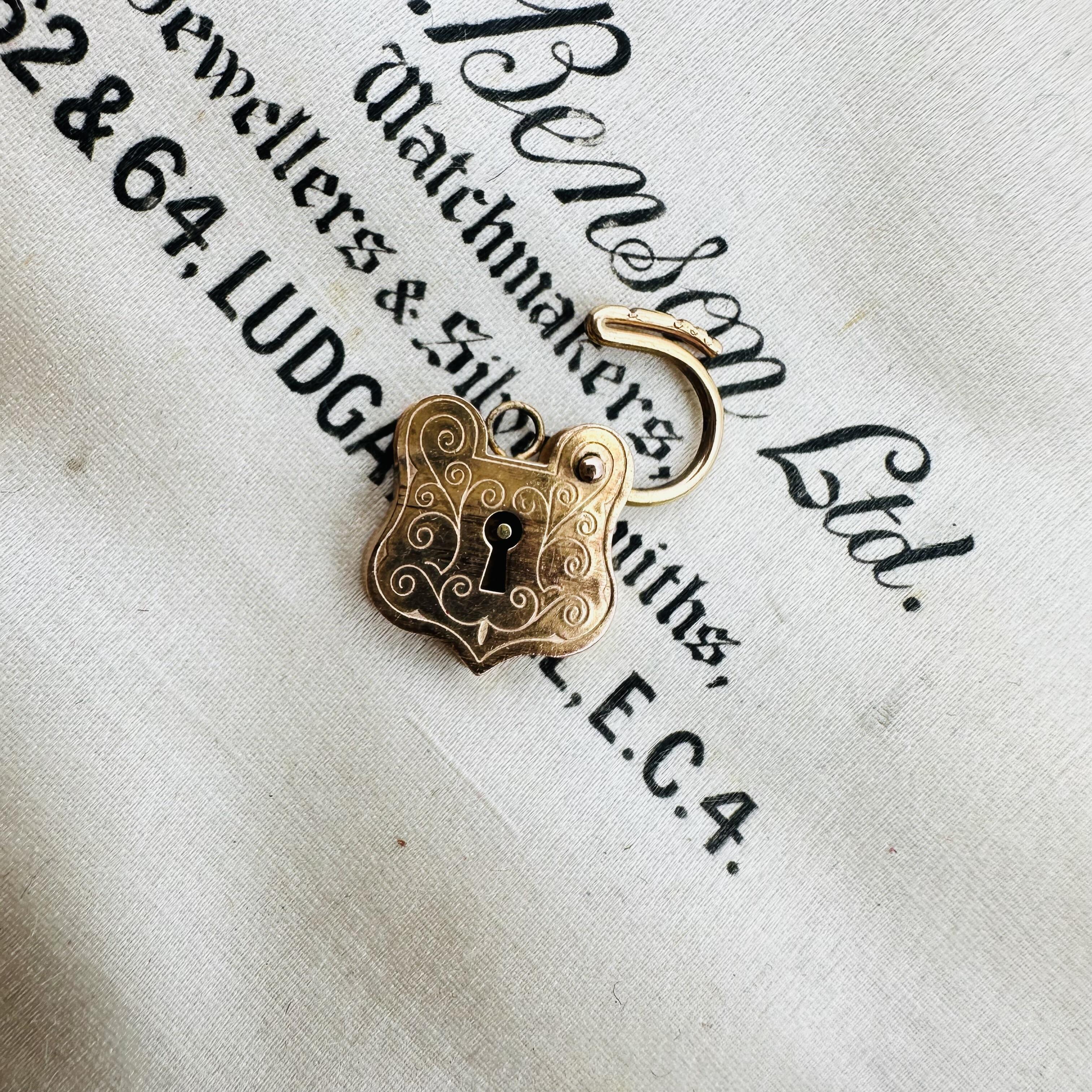Rare, Romantic Antique 9k Rose Gold Shield Padlock Clasp displayed in antique box.