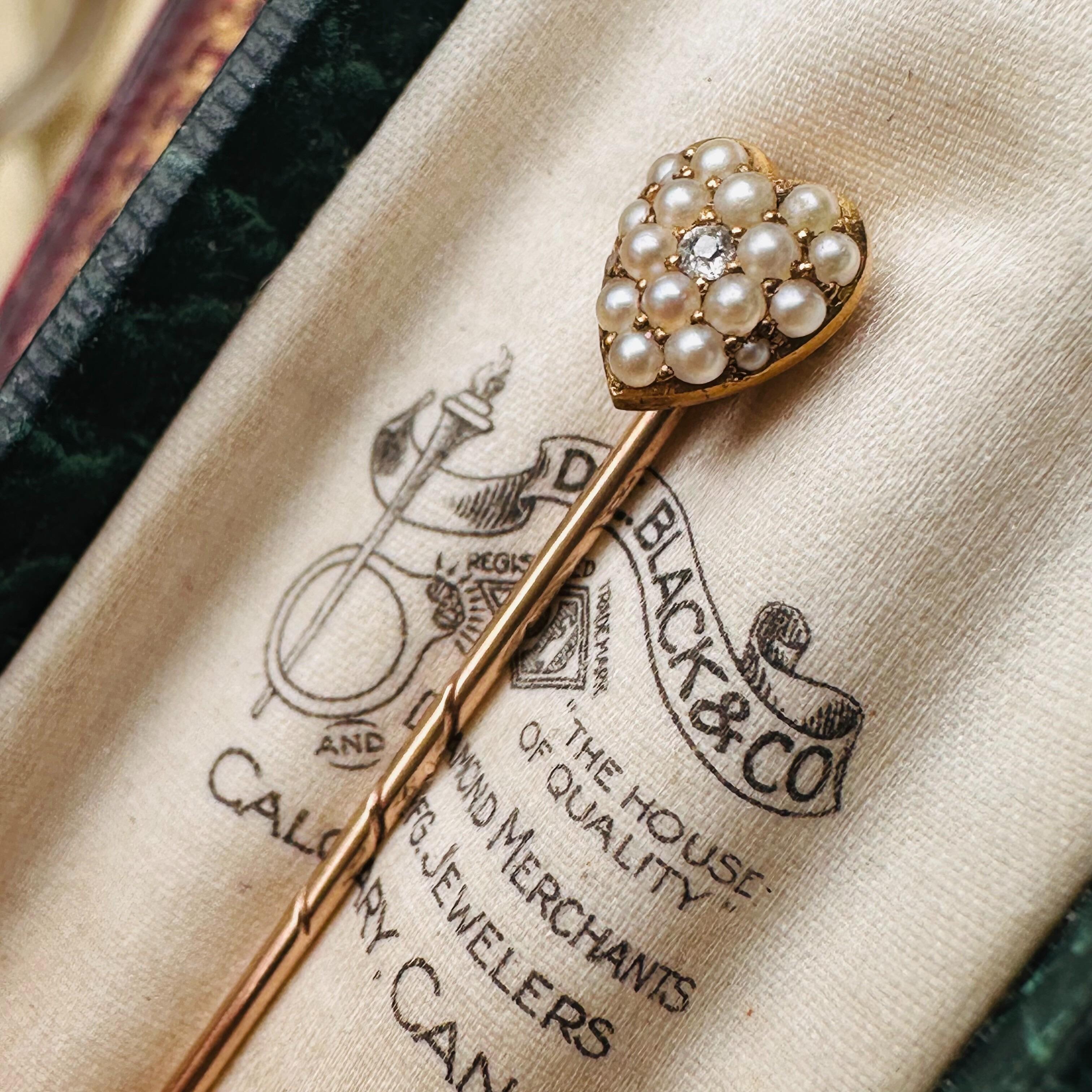 15k Gold Heart-Shaped Pearl & Diamond Stick Pin displayed in antique box