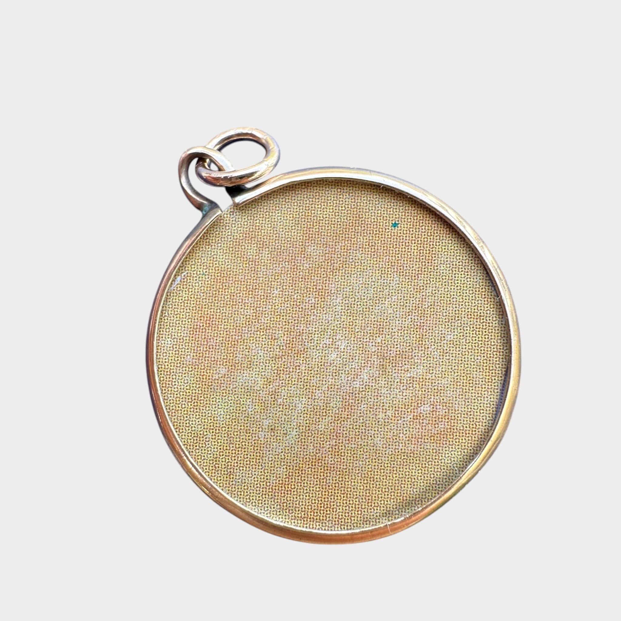 rear view  of Art Nouveau Rose Gold Locket with Portrait with grey background