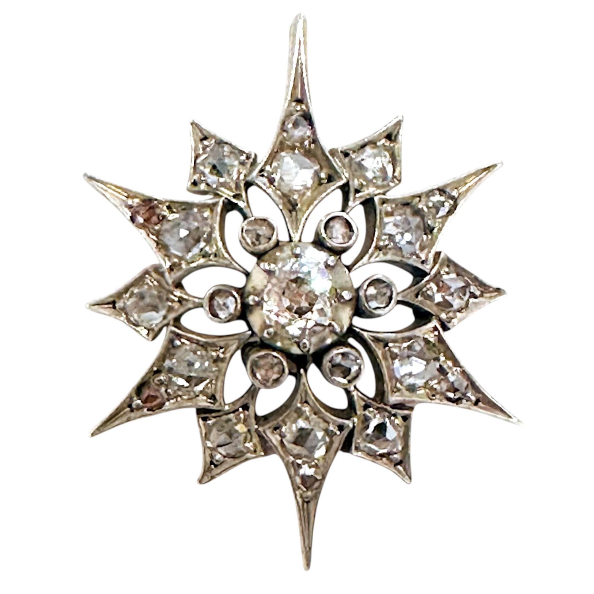 Victorian Diamond Star Pendant, Antique Silver & Rose Gold Starburst, white background.