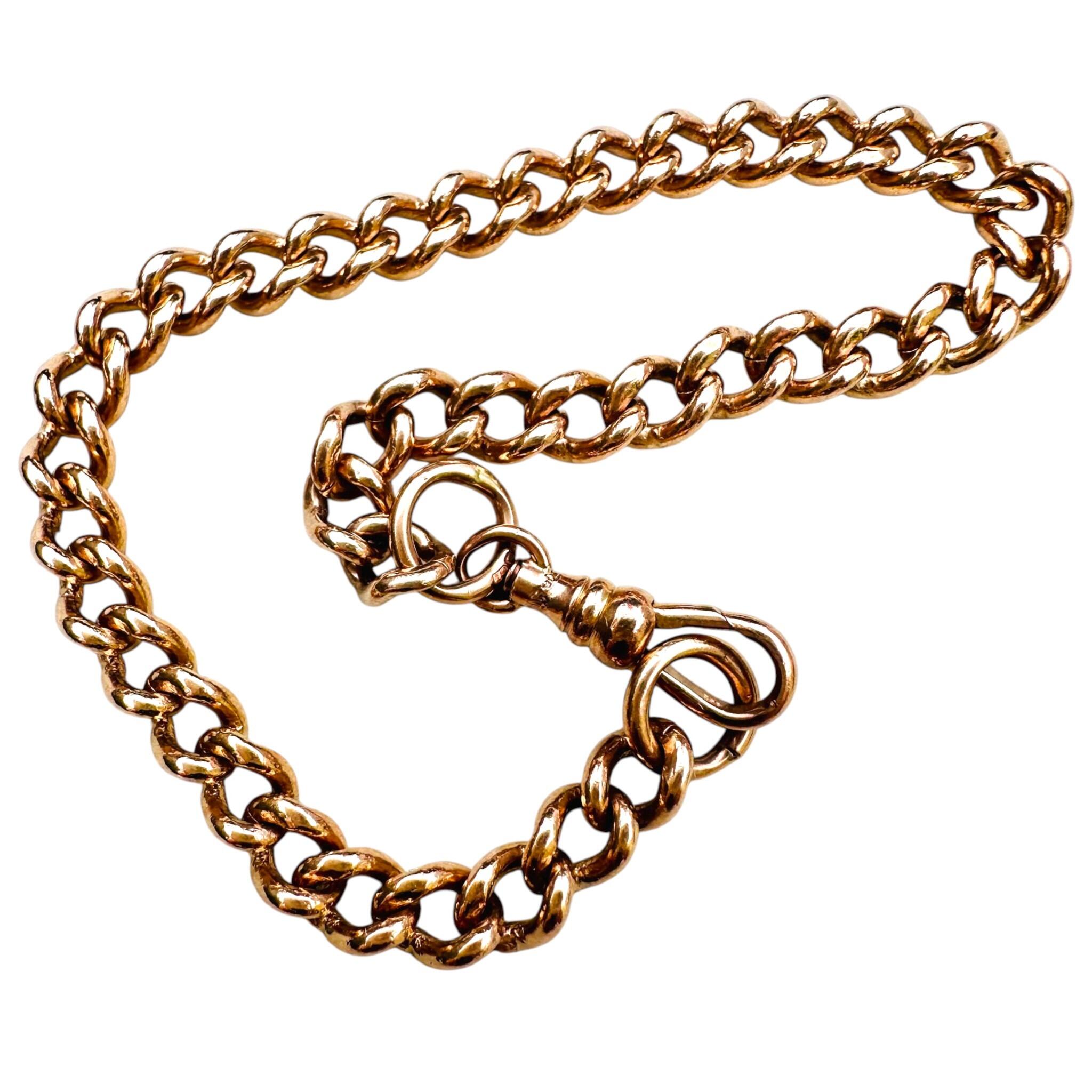 Antique Rose Gold Curb Link & Dog Clip Bracelet with white background