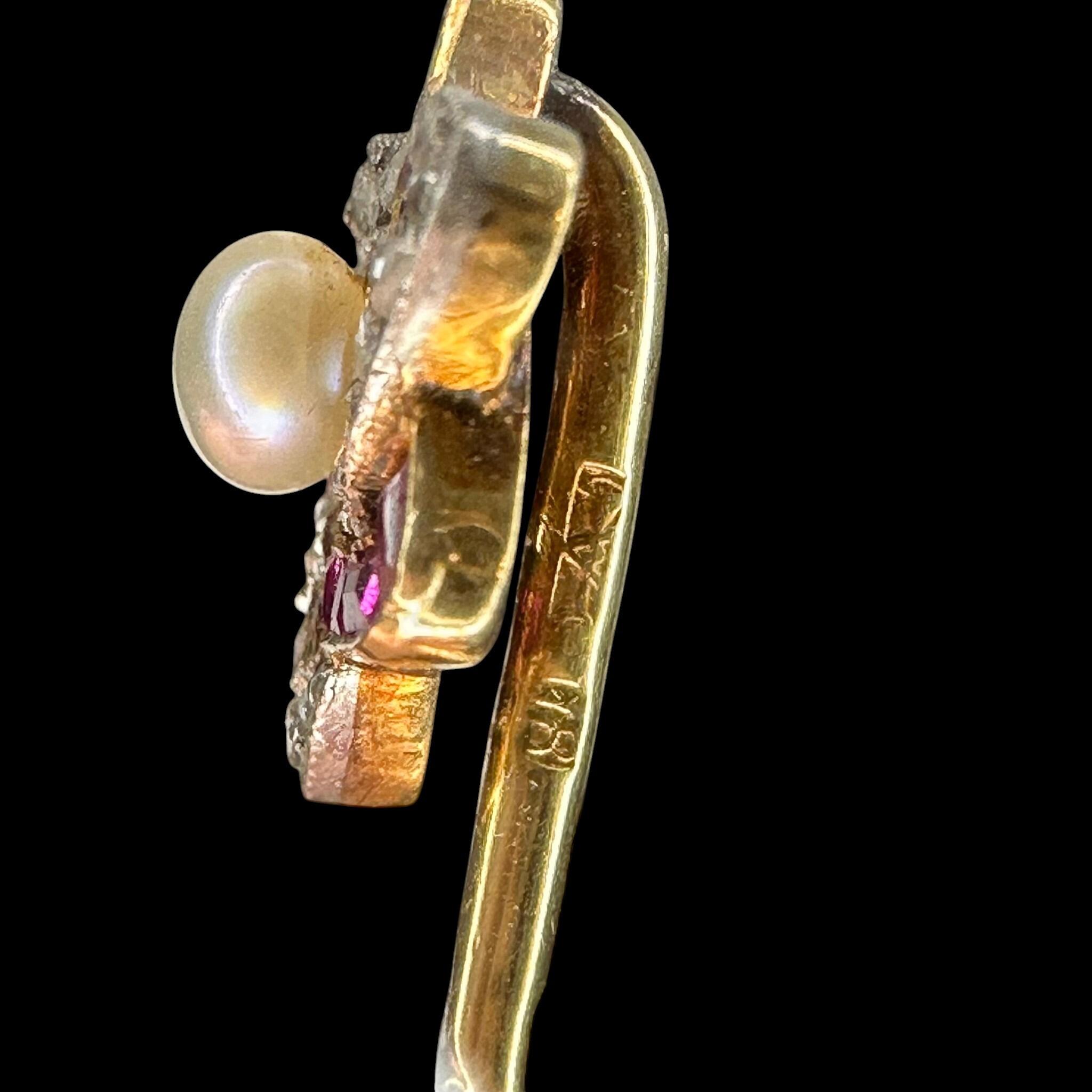 side profile of Antique Ruby Diamond & Pearl Star Stick Pin  with black background