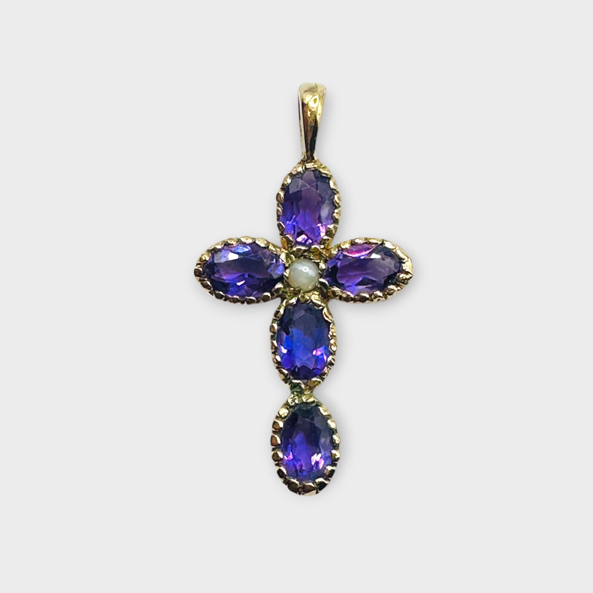 9ct gold amethyst & Pearl cross pendant on grey background.