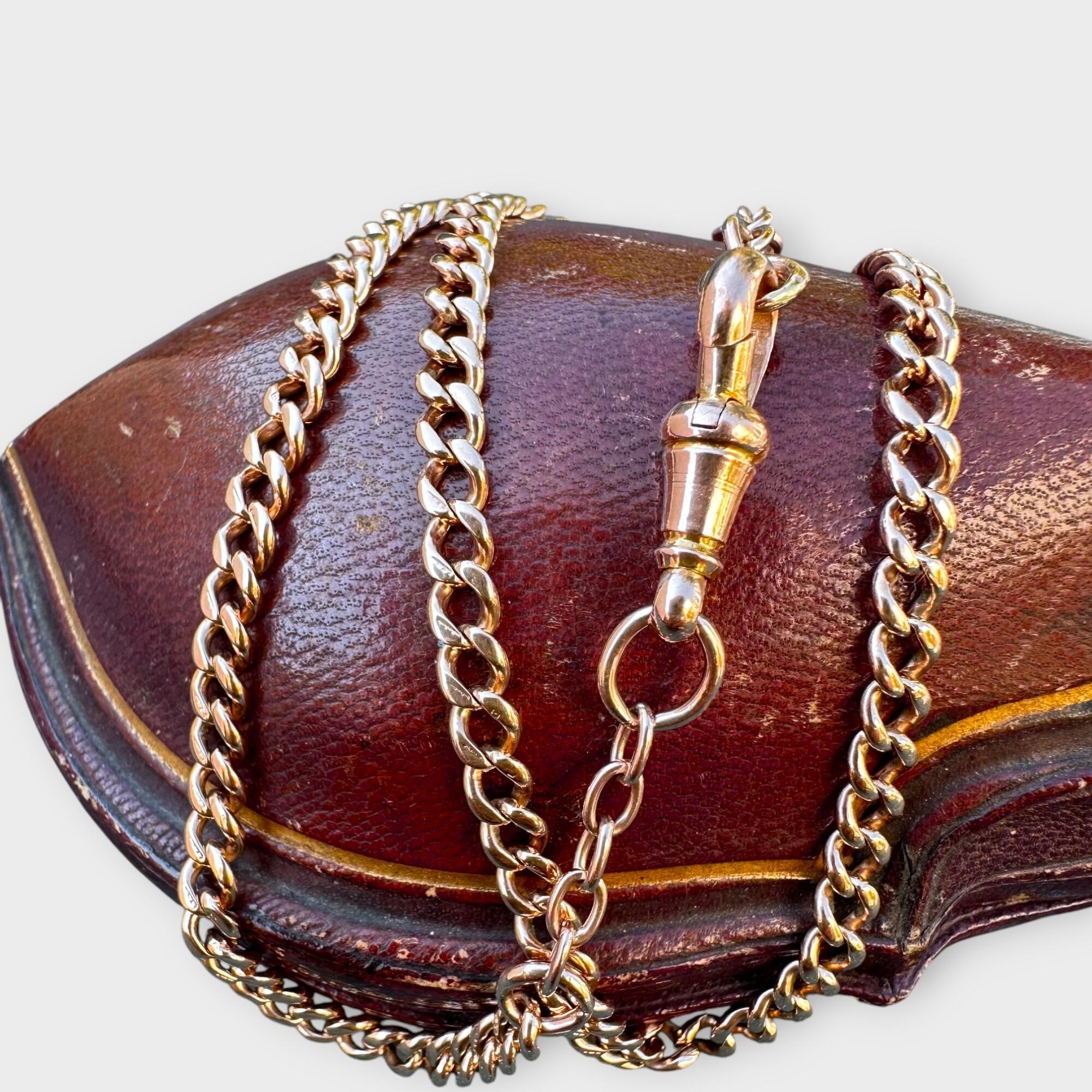 Edwardian 9ct Rose Gold Albert chain with dog clip, 19" / 48cm, on a red antique box.
