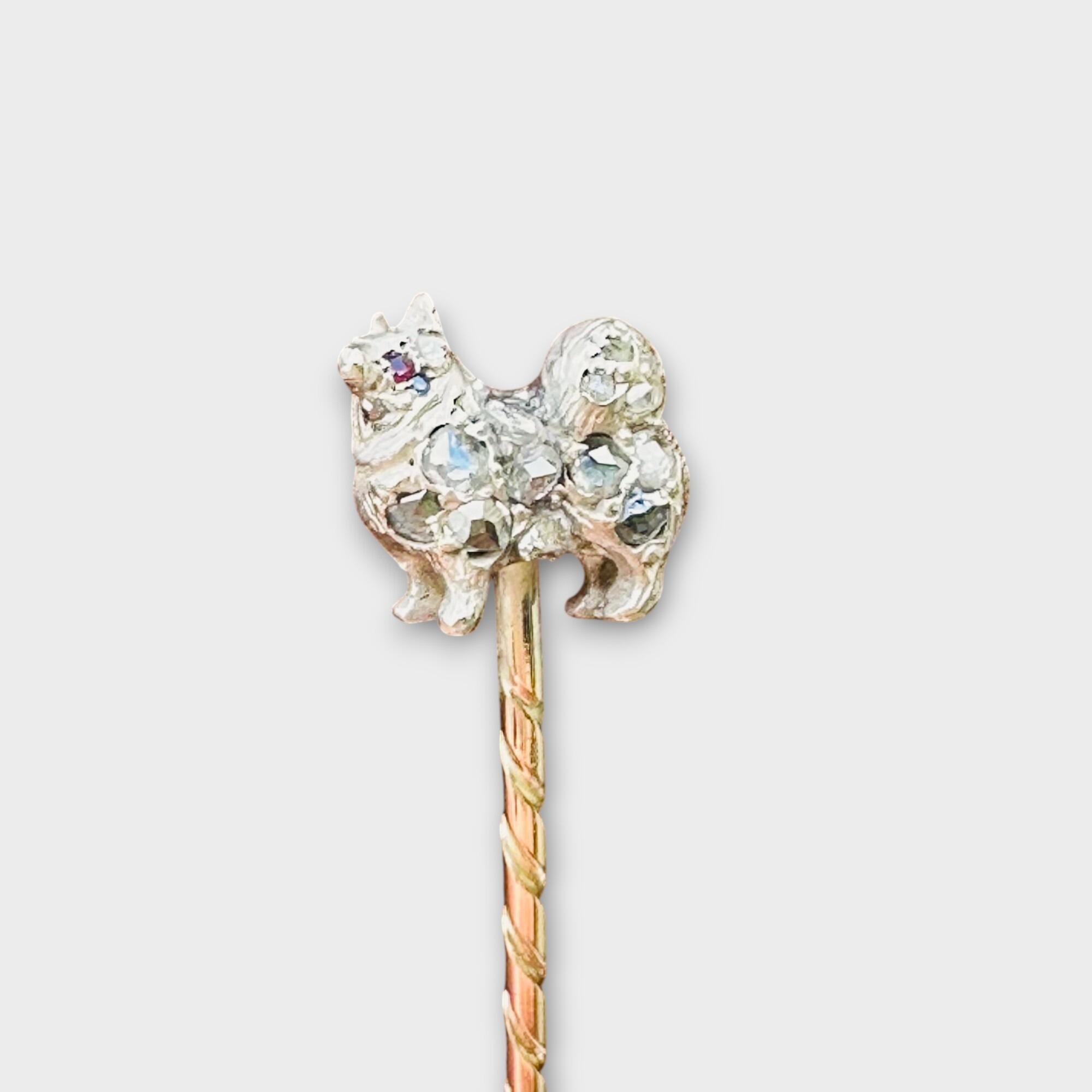 19th-century stick pin with Pomeranian dog motif and rose cut diamonds.