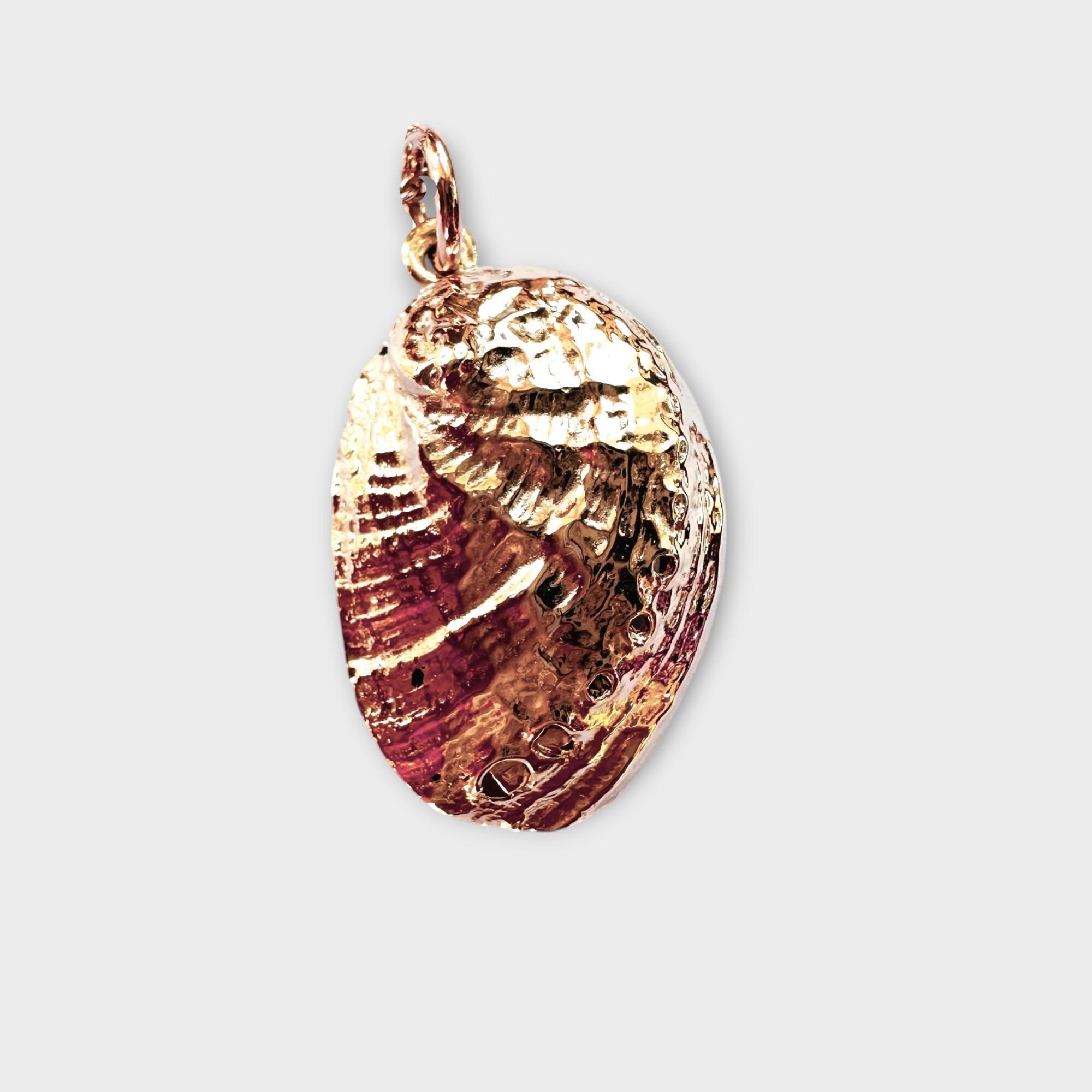 Vintage 9ct rose gold ormer shell pendant displayed on a neutral background.