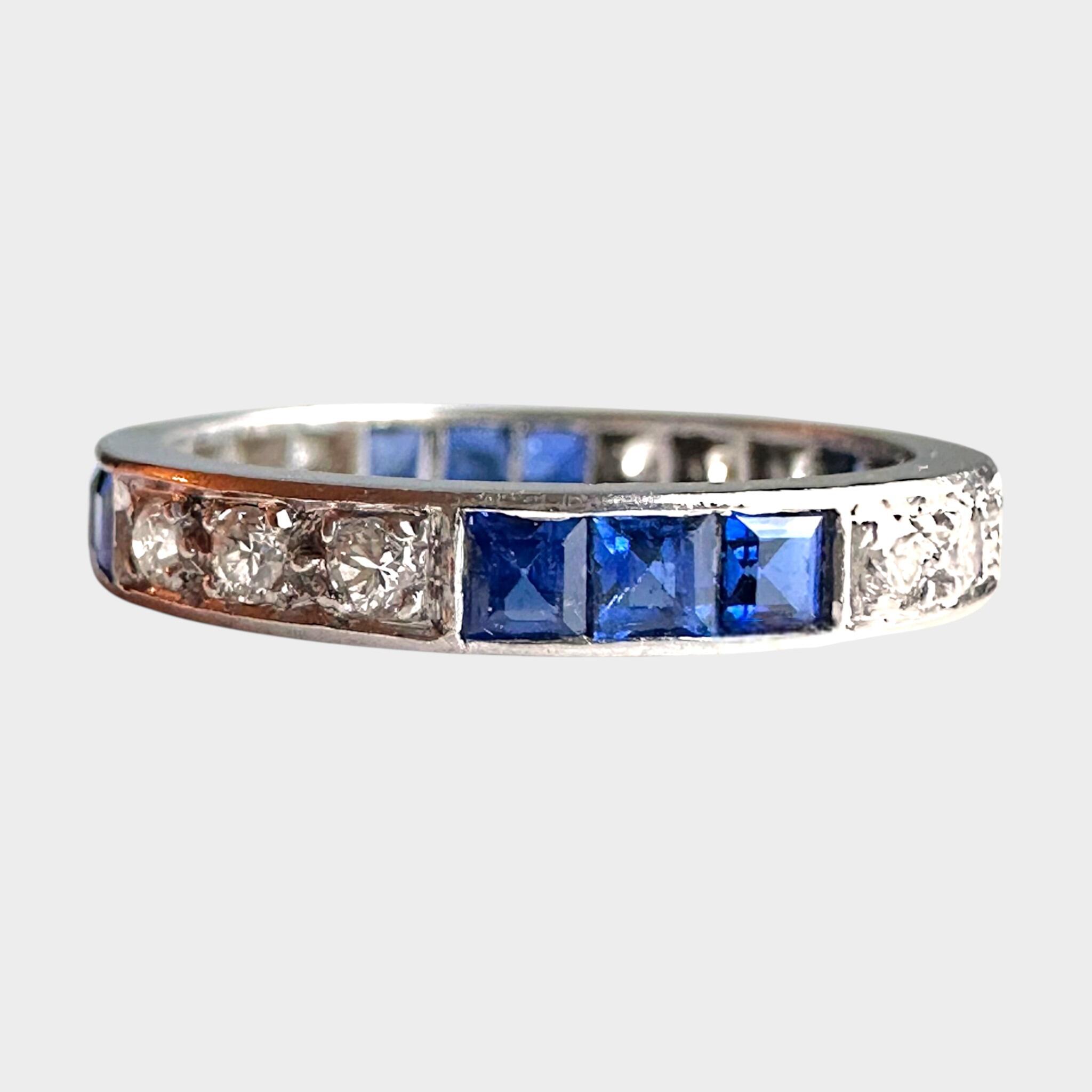 Platinum, Sapphire & Diamond Full Eternity Ring, grey background.