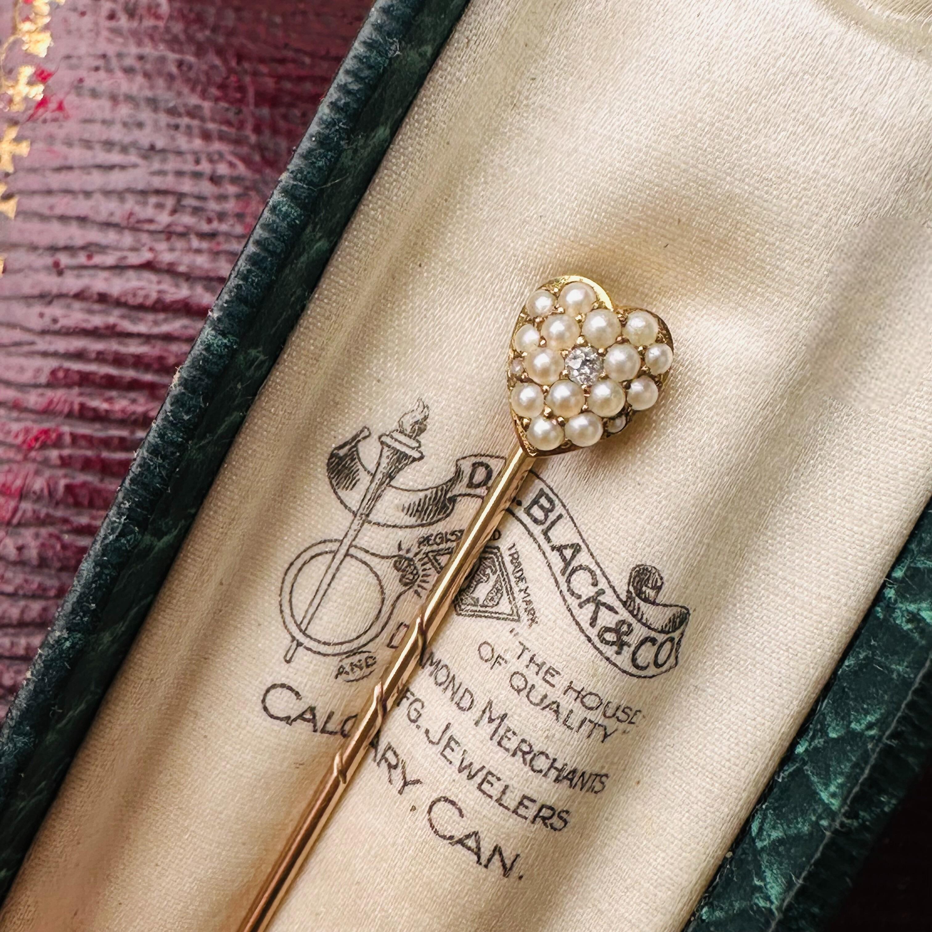 15k Gold Heart-Shaped Pearl & Diamond Stick Pin displayed in antique box