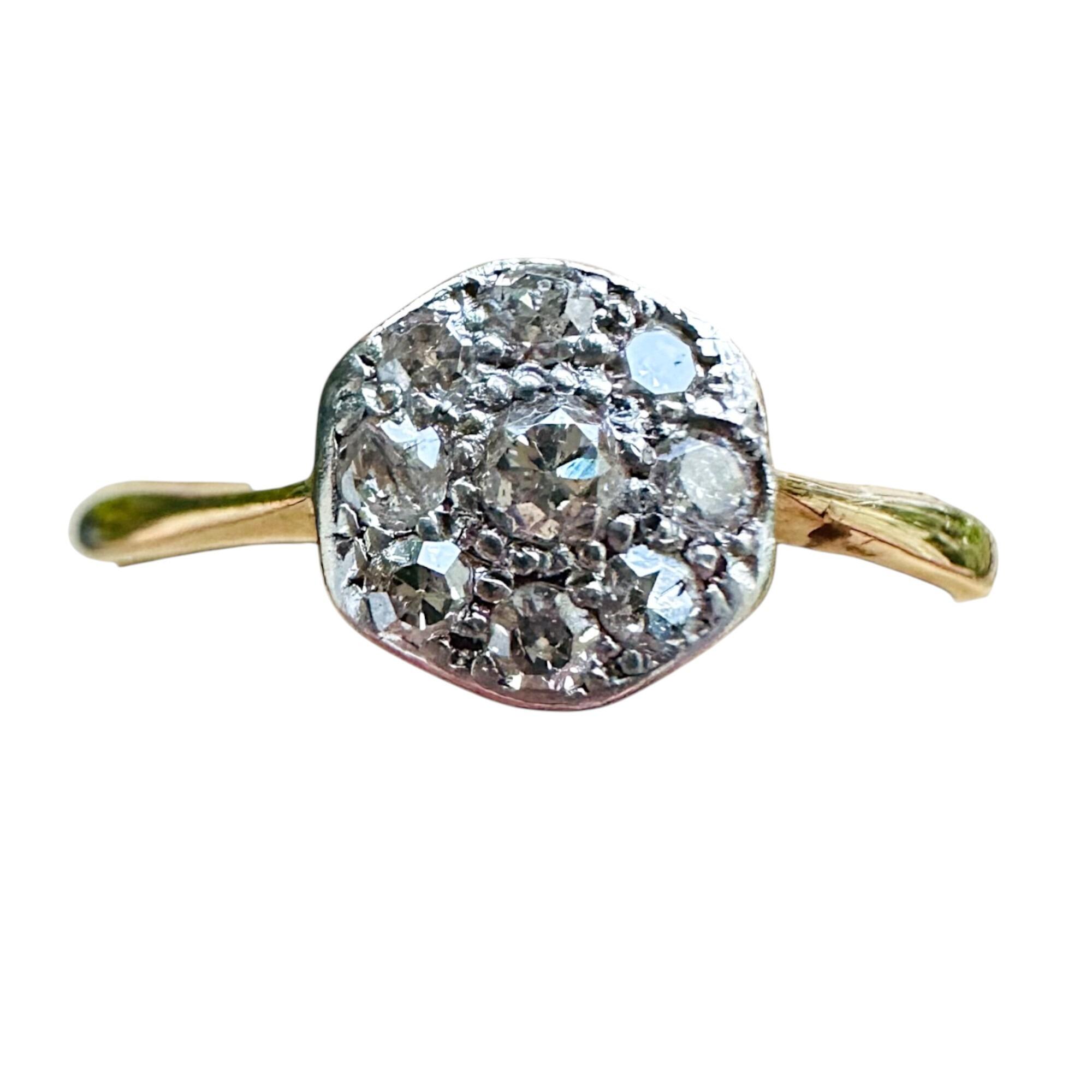 Edwardian 18k Gold Diamond hexagonal Cluster Ring, White background.